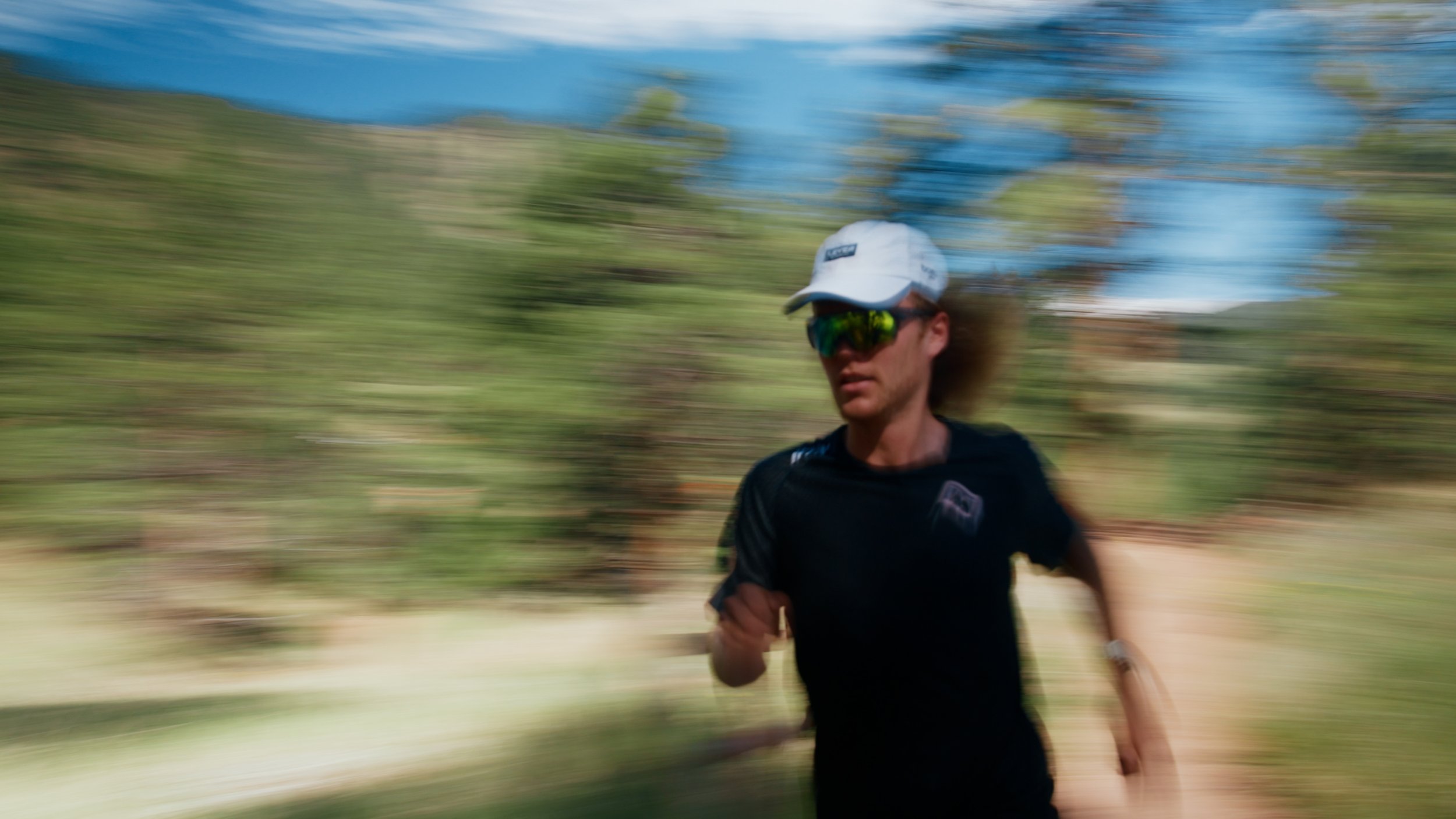 Bayden running in the forests of Boulder, Colorado