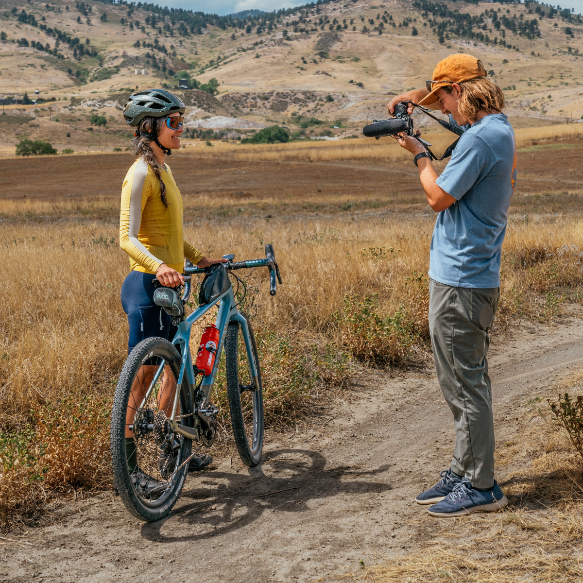 Roo photographing a cyclist in Boulder, Colorado