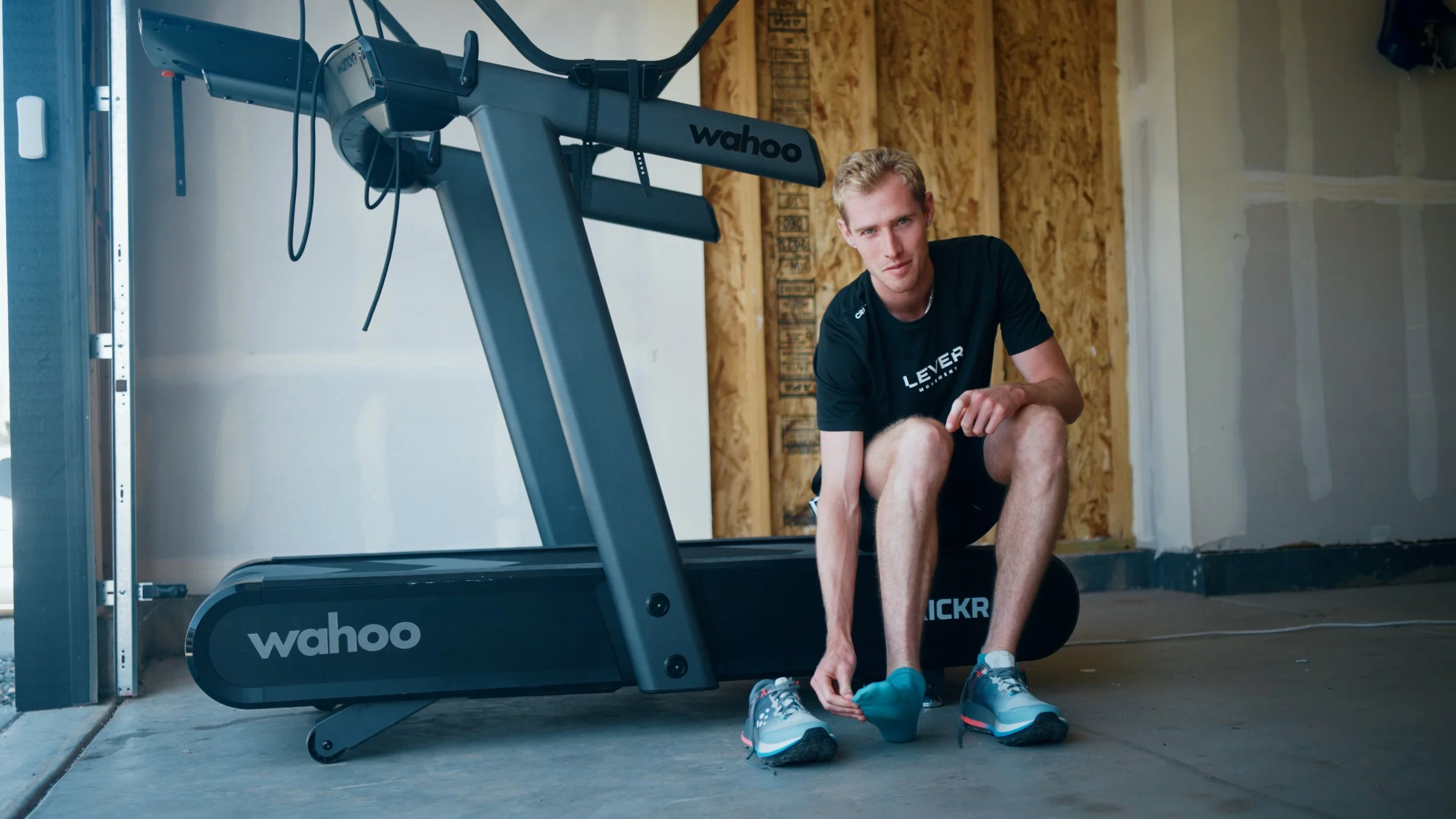 Behind the scenes of a Boulder trail running documentary with Ares at a treadmill preparing for a run