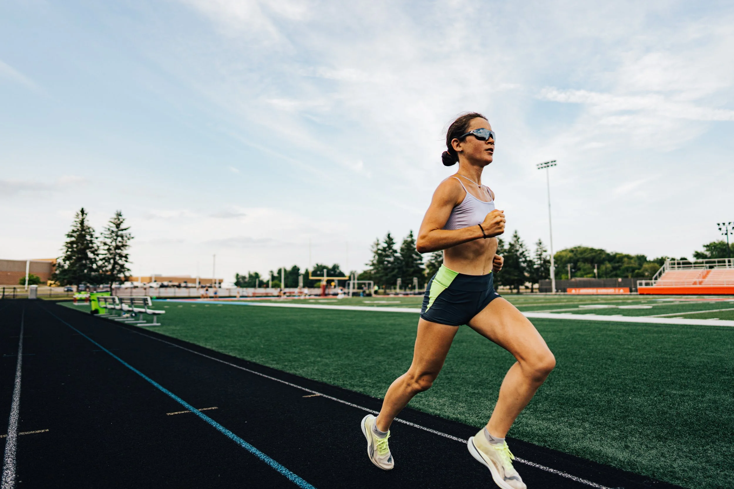 Olympian Molly Seidel running on a track
