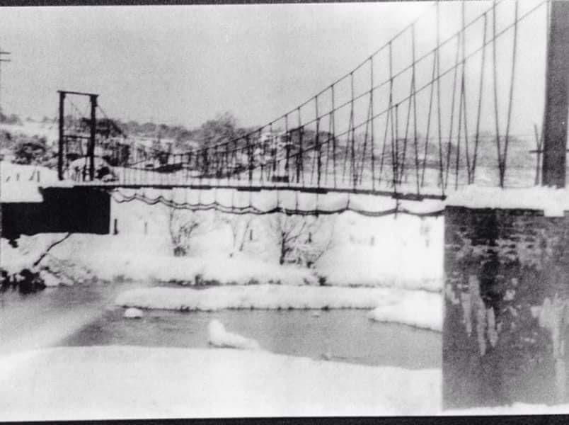 swing bridge in snow