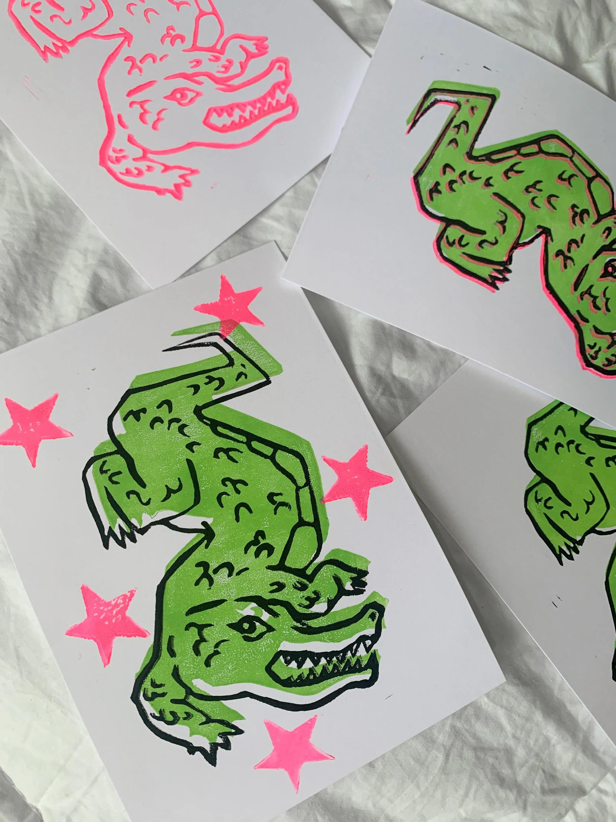 misaligned, misprinted and messy 🐊💕

I spent the last 3 days carving this double sided Lino block. Some adjustments needed to be made and I will have to figure out a better alignment system but I think the vision is there ♡