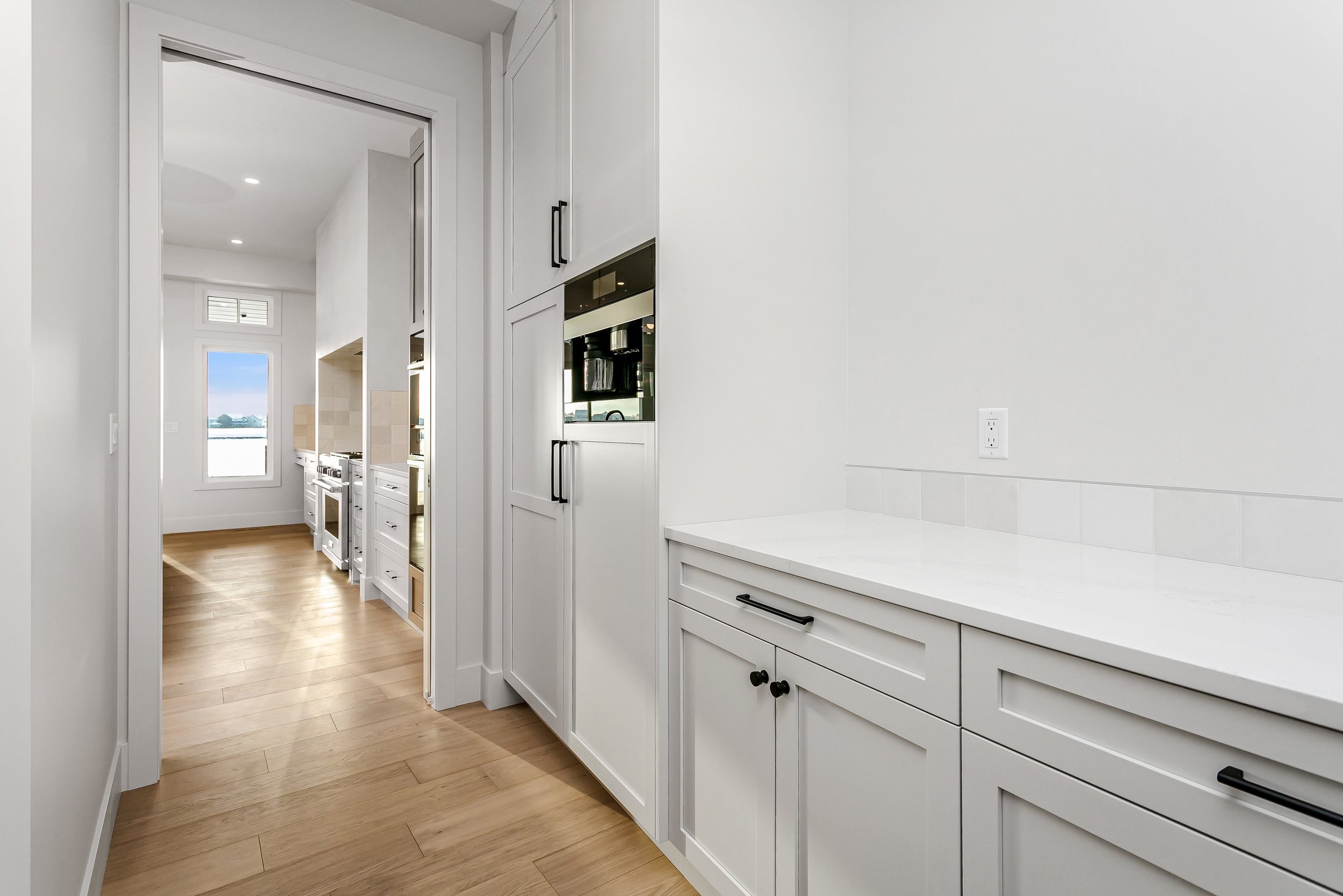 Butler's pantry in the Lakefront at 24 Jubilation Drive in Jensen Lakes St. Albert by Urbis Infill Homes. (Copy)