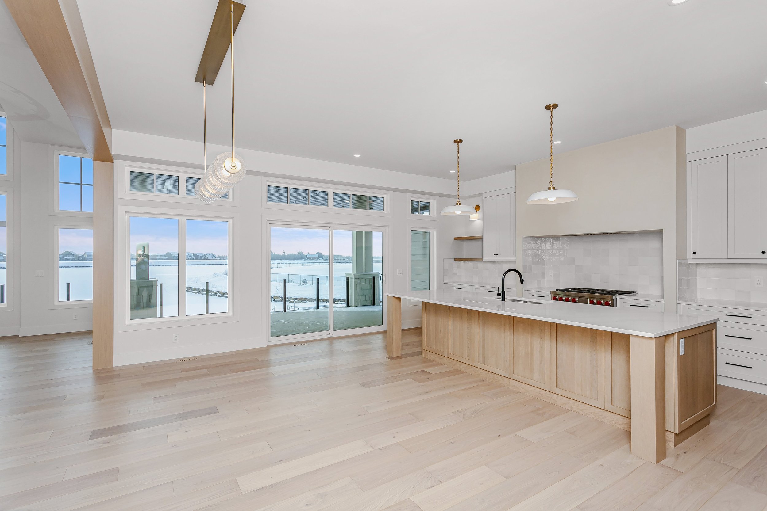 Kitchen in the Lakefront at 24 Jubilation Drive in Jensen Lakes St. Albert by Urbis Infill Homes. (Copy)