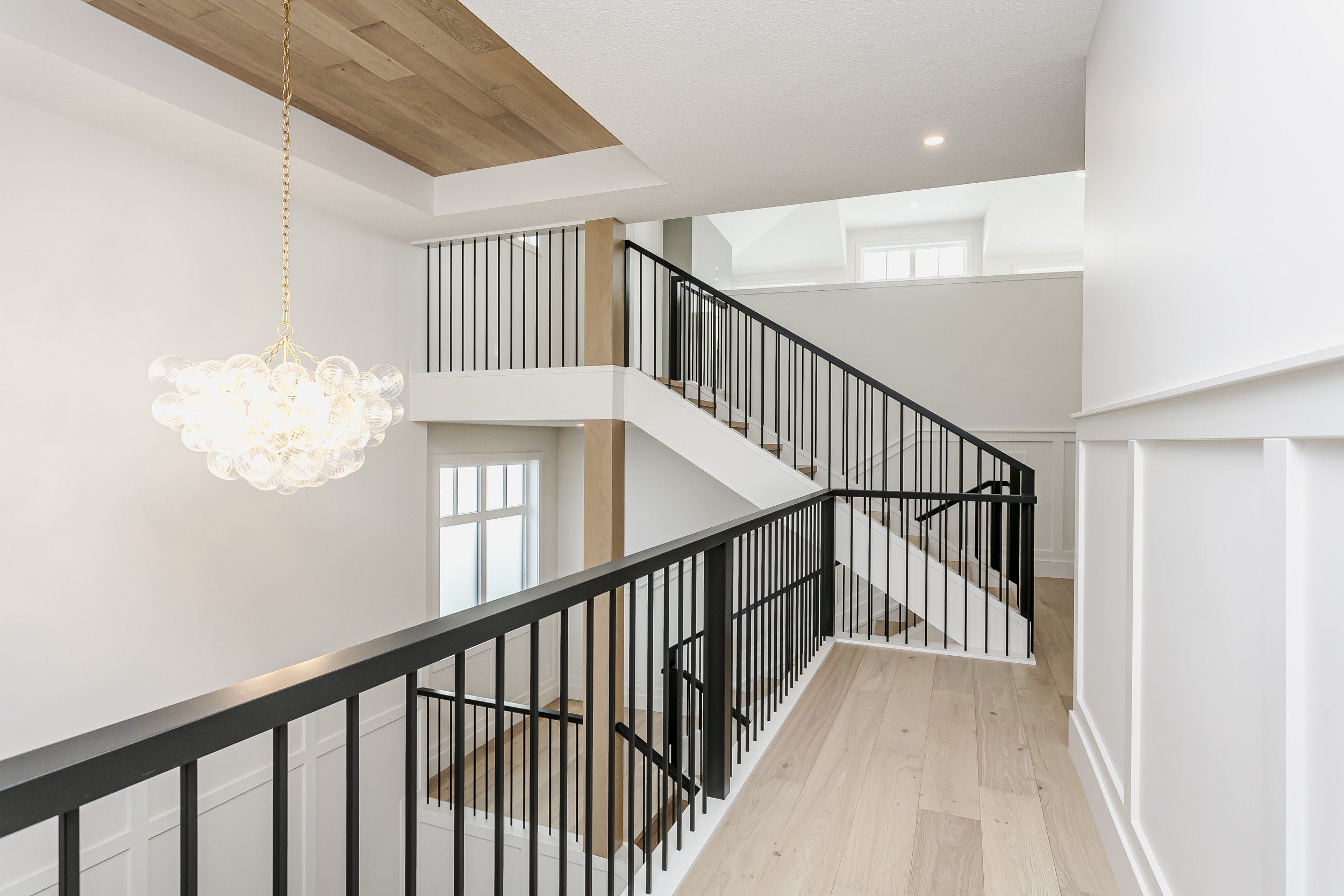 Hallway in the Lakefront at 24 Jubilation Drive in Jensen Lakes St. Albert by Urbis Infill Homes. (Copy)