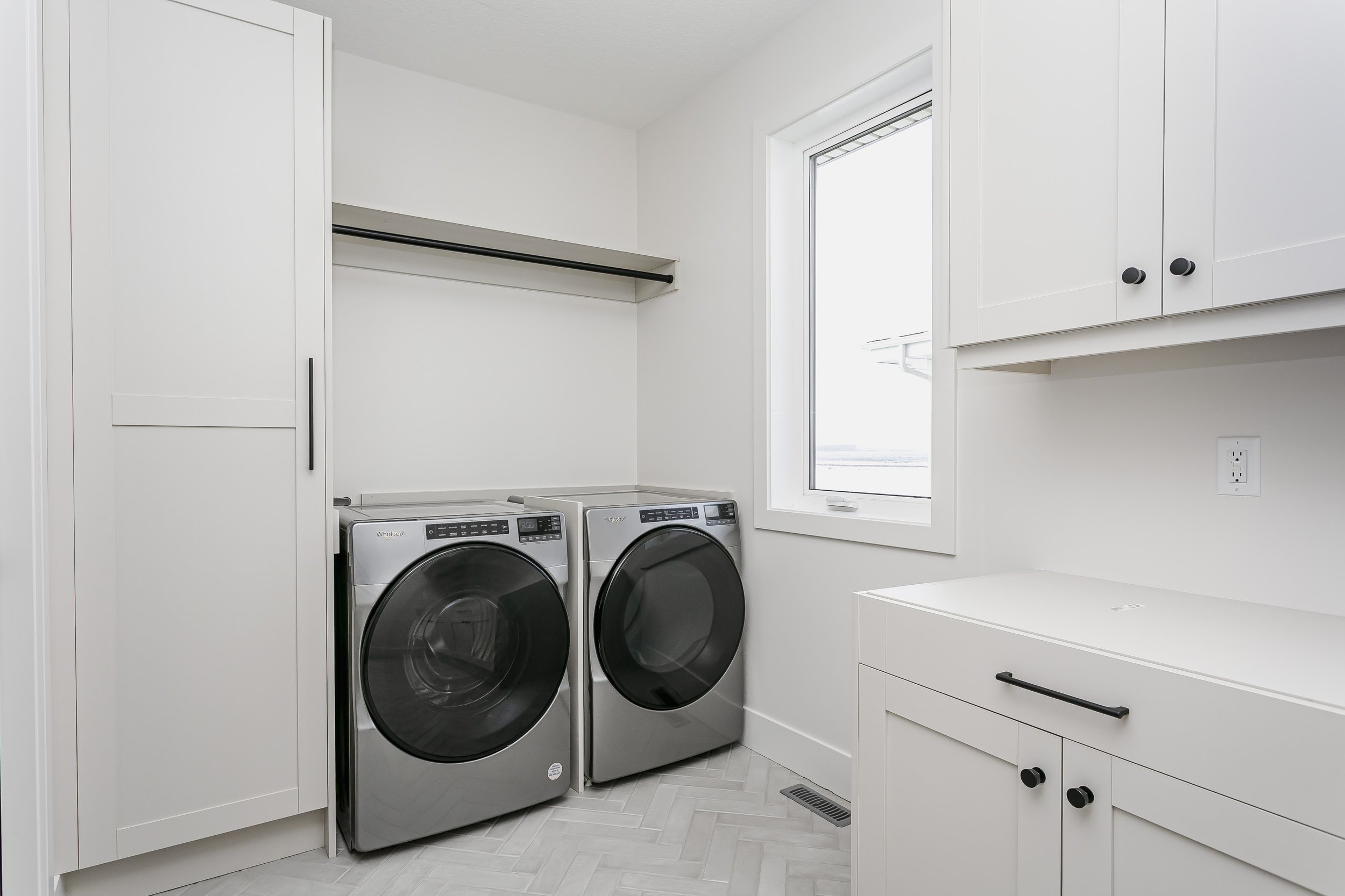 Laundry room in the Lakefront at 24 Jubilation Drive in Jensen Lakes St. Albert by Urbis Infill Homes. (Copy)