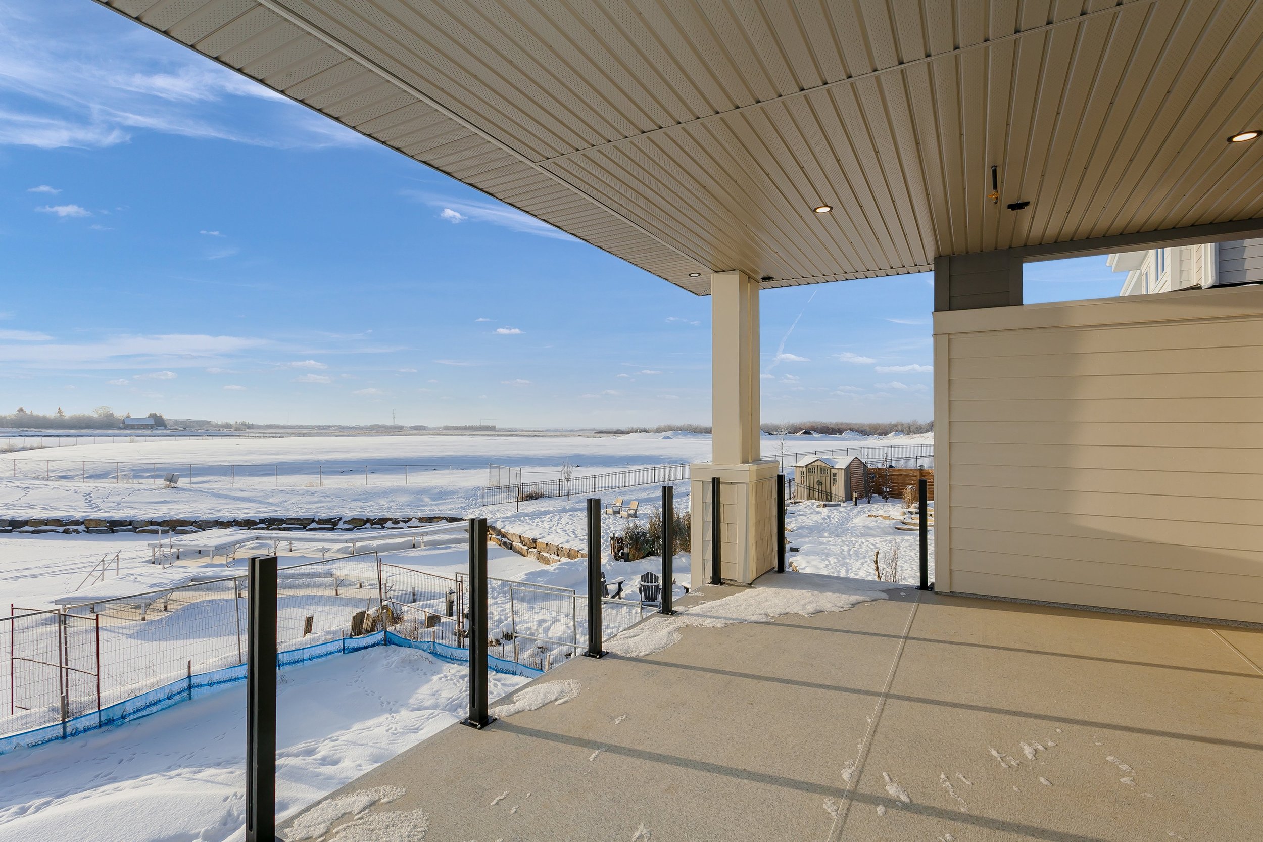 Balcony with lake view in the Lakefront at 24 Jubilation Drive in Jensen Lakes St. Albert by Urbis Infill Homes. (Copy)