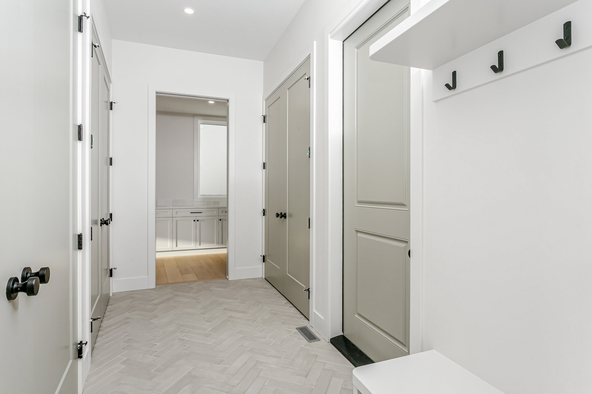 Mudroom in the Lakefront at 24 Jubilation Drive in Jensen Lakes St. Albert by Urbis Infill Homes. (Copy)