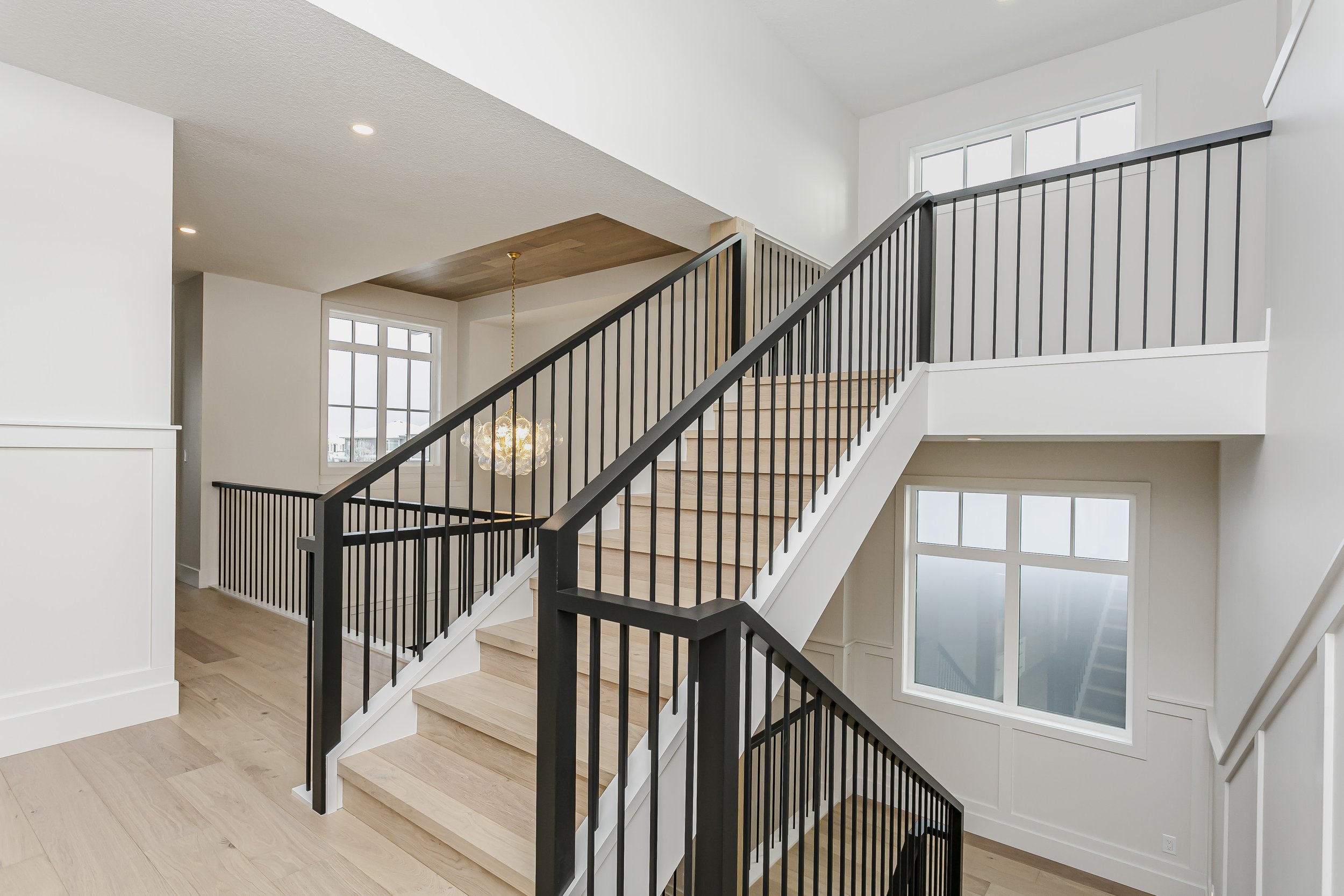 Stairwell in the Lakefront at 24 Jubilation Drive in Jensen Lakes St. Albert by Urbis Infill Homes. (Copy)