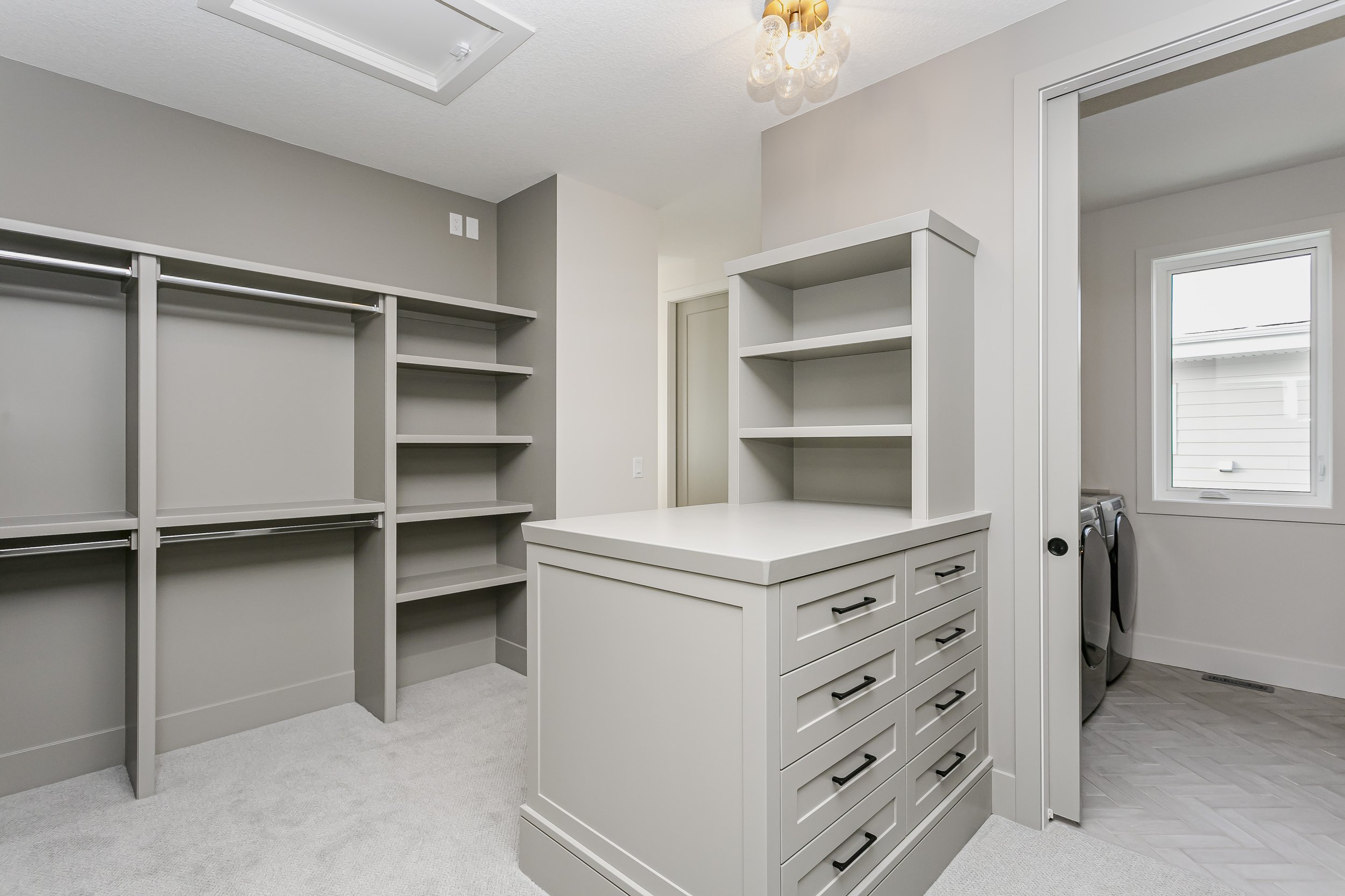 Walk-in closet in the Lakefront at 24 Jubilation Drive in Jensen Lakes St. Albert by Urbis Infill Homes. (Copy)