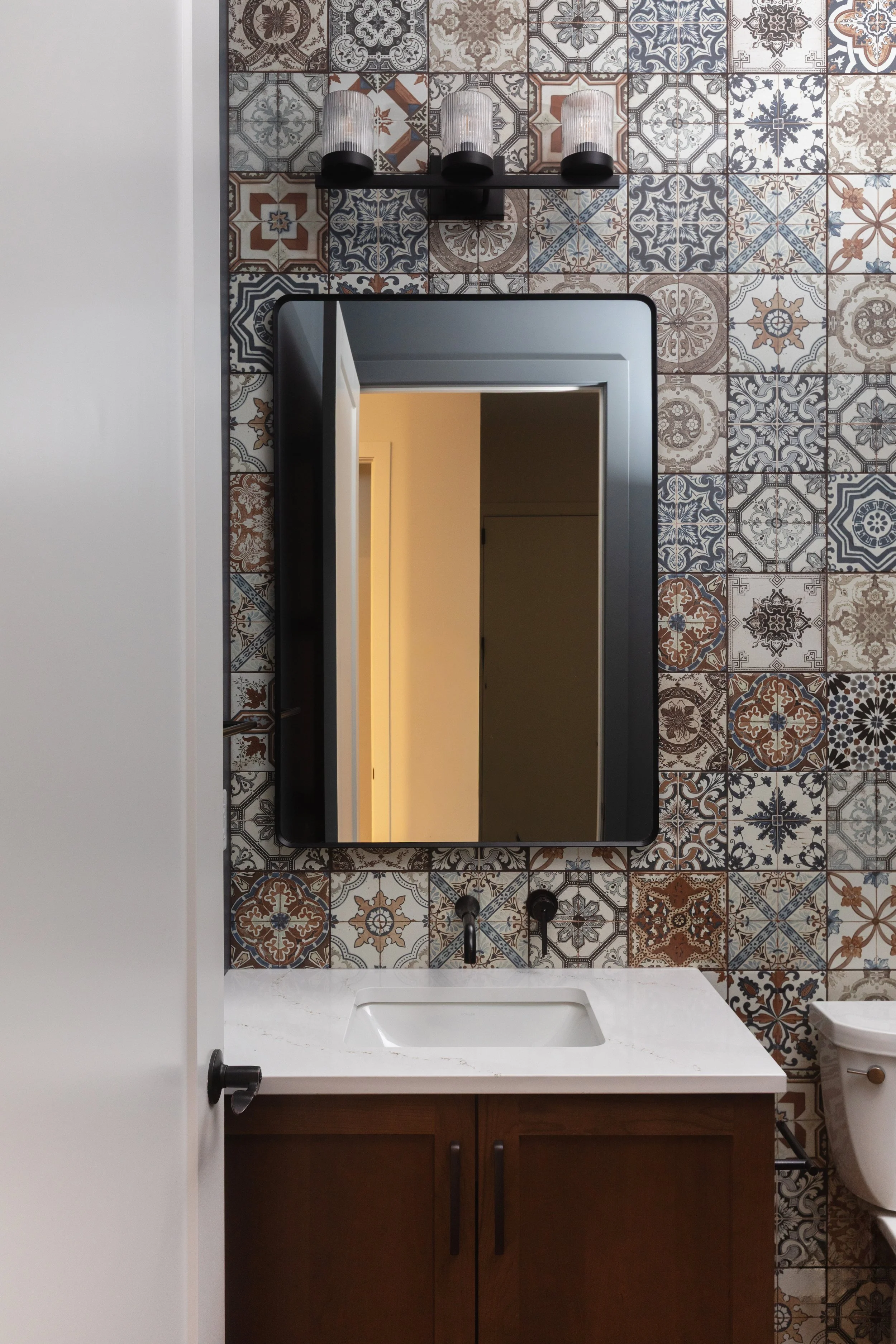 Powder room in Parkview 89 custom home by Urbis Infill Homes in Edmonton.