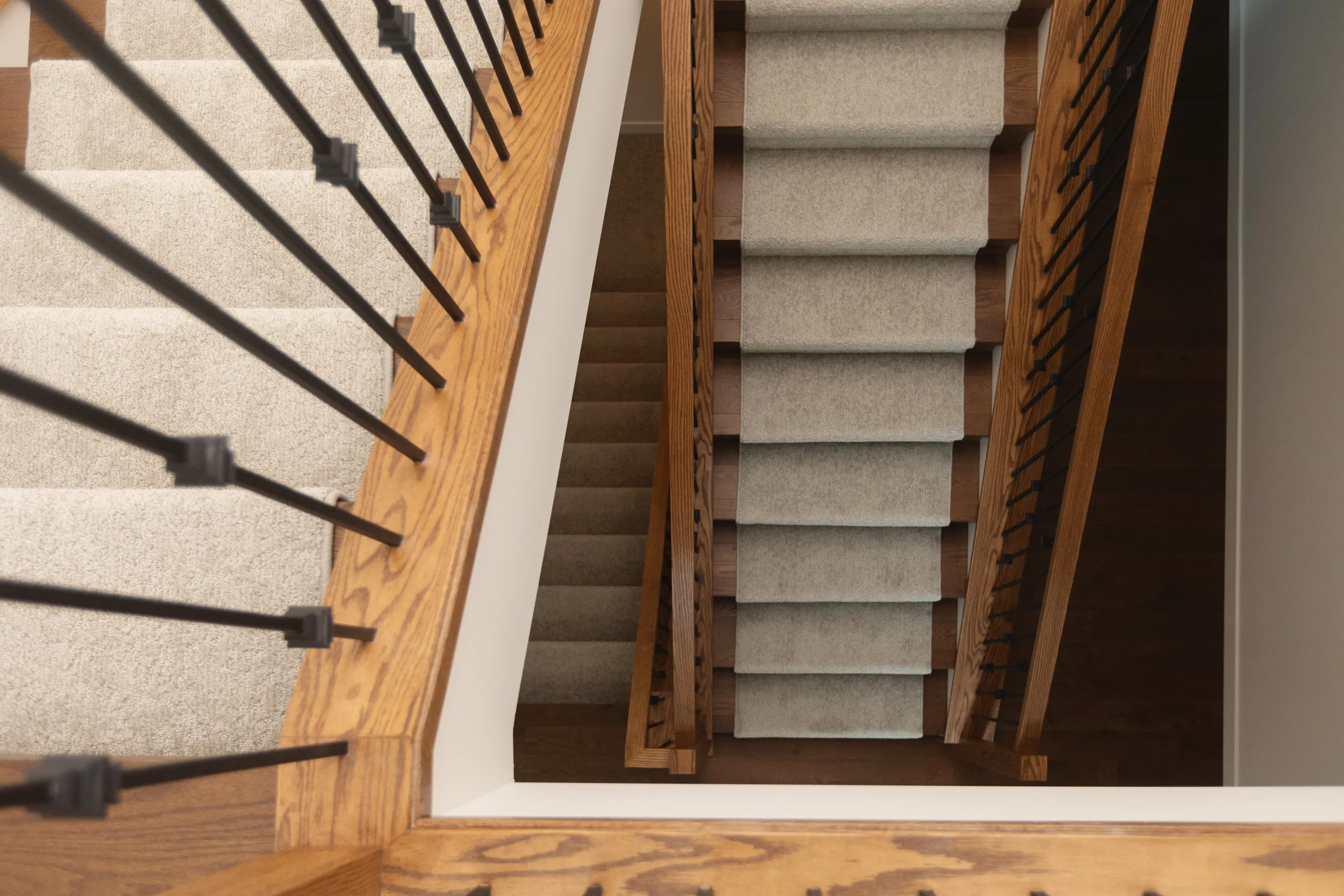 Stairwell in Parkview 89 custom home by Urbis Infill Homes in Edmonton.