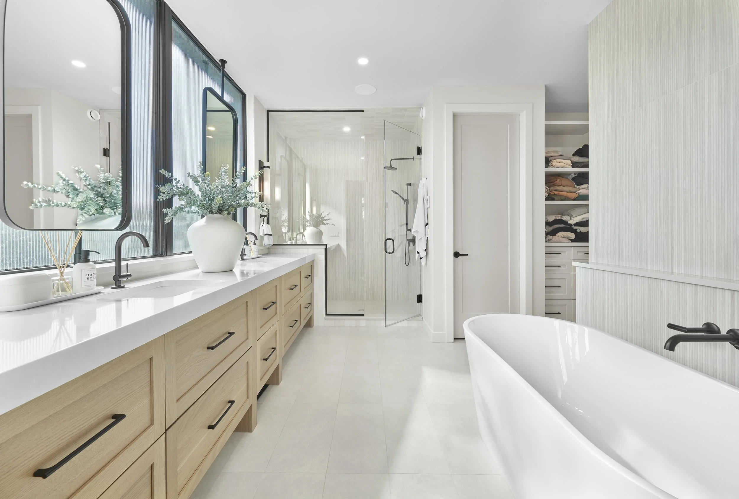 Primary bathroom in Glenora 139 Custom by Urbis Infill Homes in Edmonton.