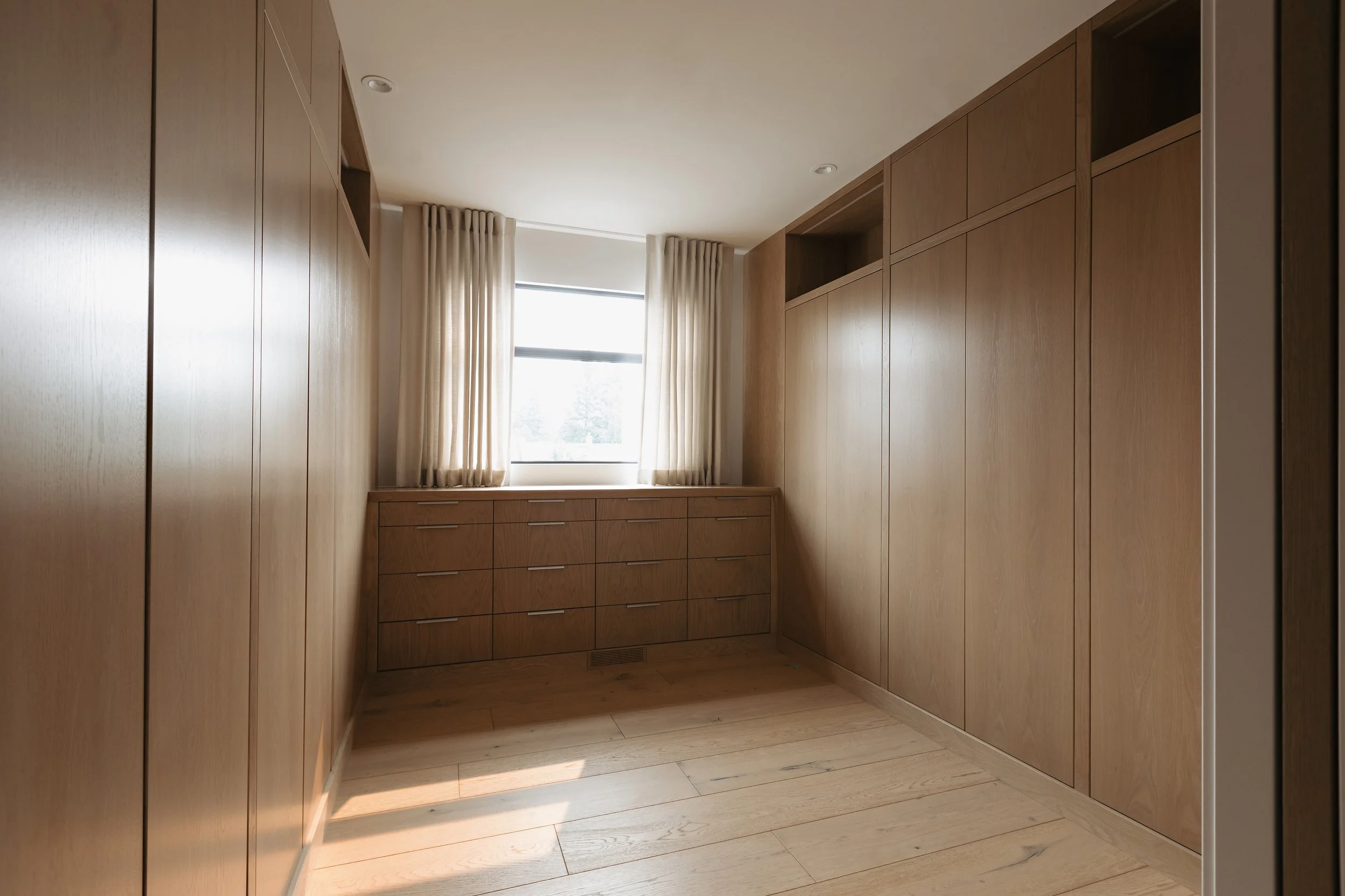Walk-in closet in Crestwood 146 Custom by Urbis Infill Homes in Edmonton.
