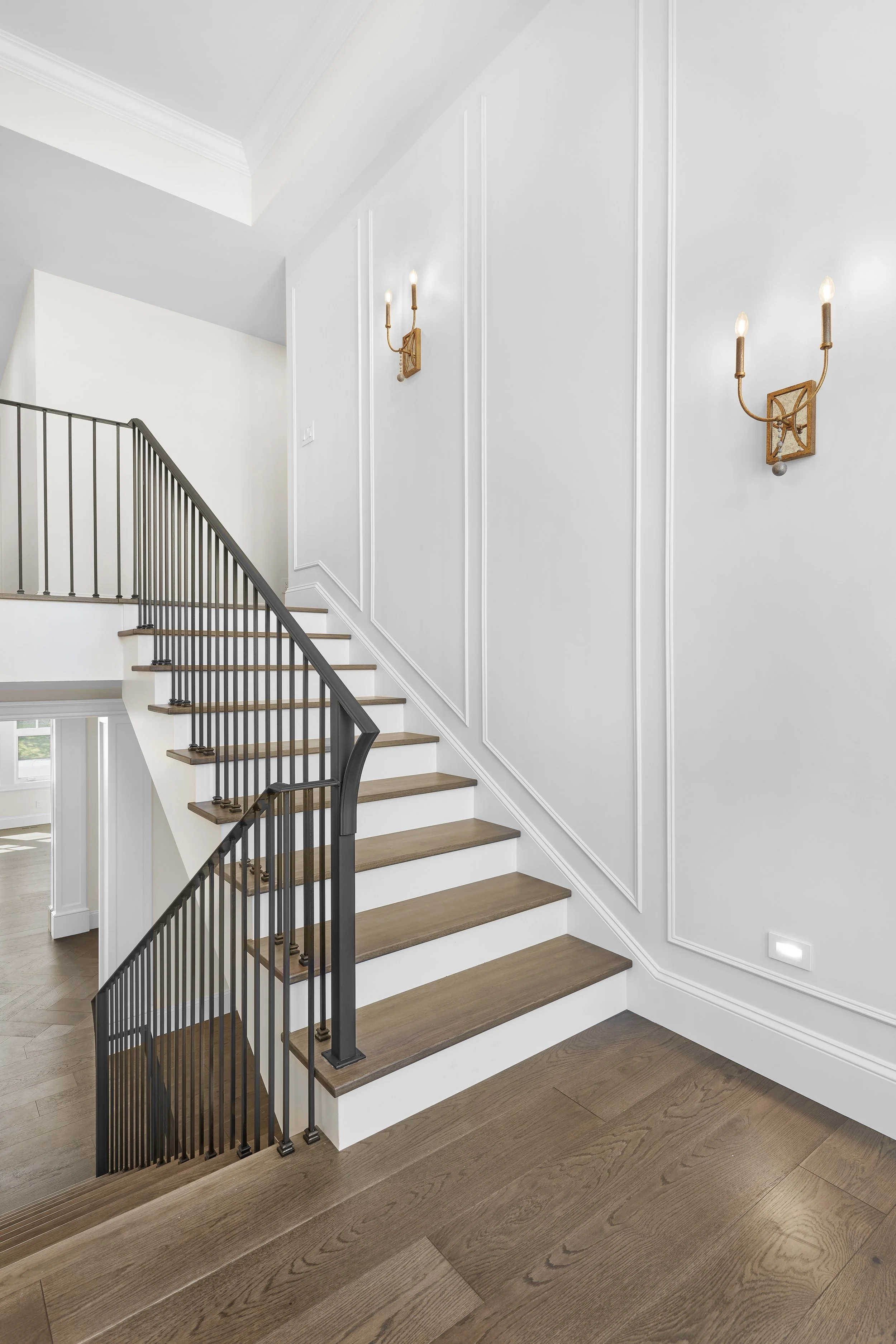 Staircase in Summit Drive Custom by Urbis Infill Homes in Edmonton.