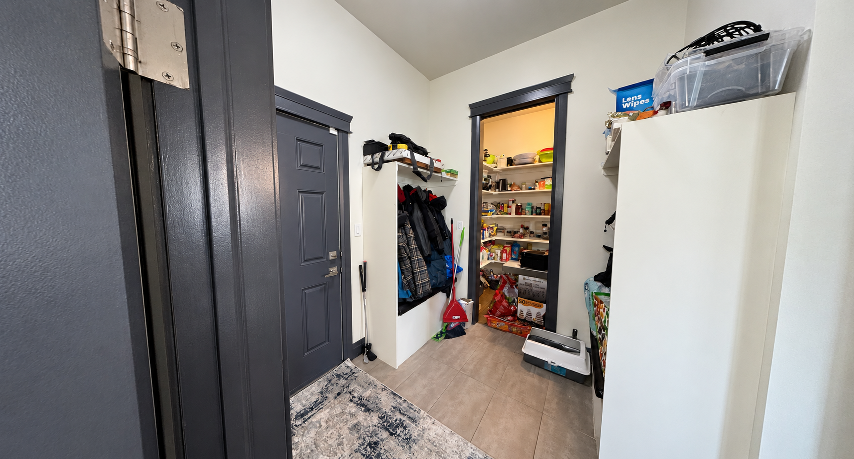 Mudroom in the Sherwood Park Reno by Urbis Infill Homes.