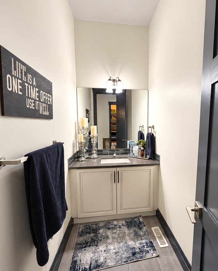 Powder room in the Sherwood Park Reno by Urbis Infill Homes.