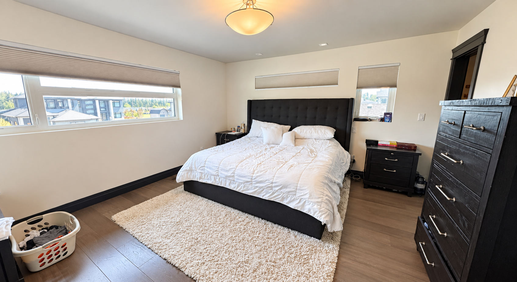 Primary bedroom in the Sherwood Park Reno by Urbis Infill Homes.