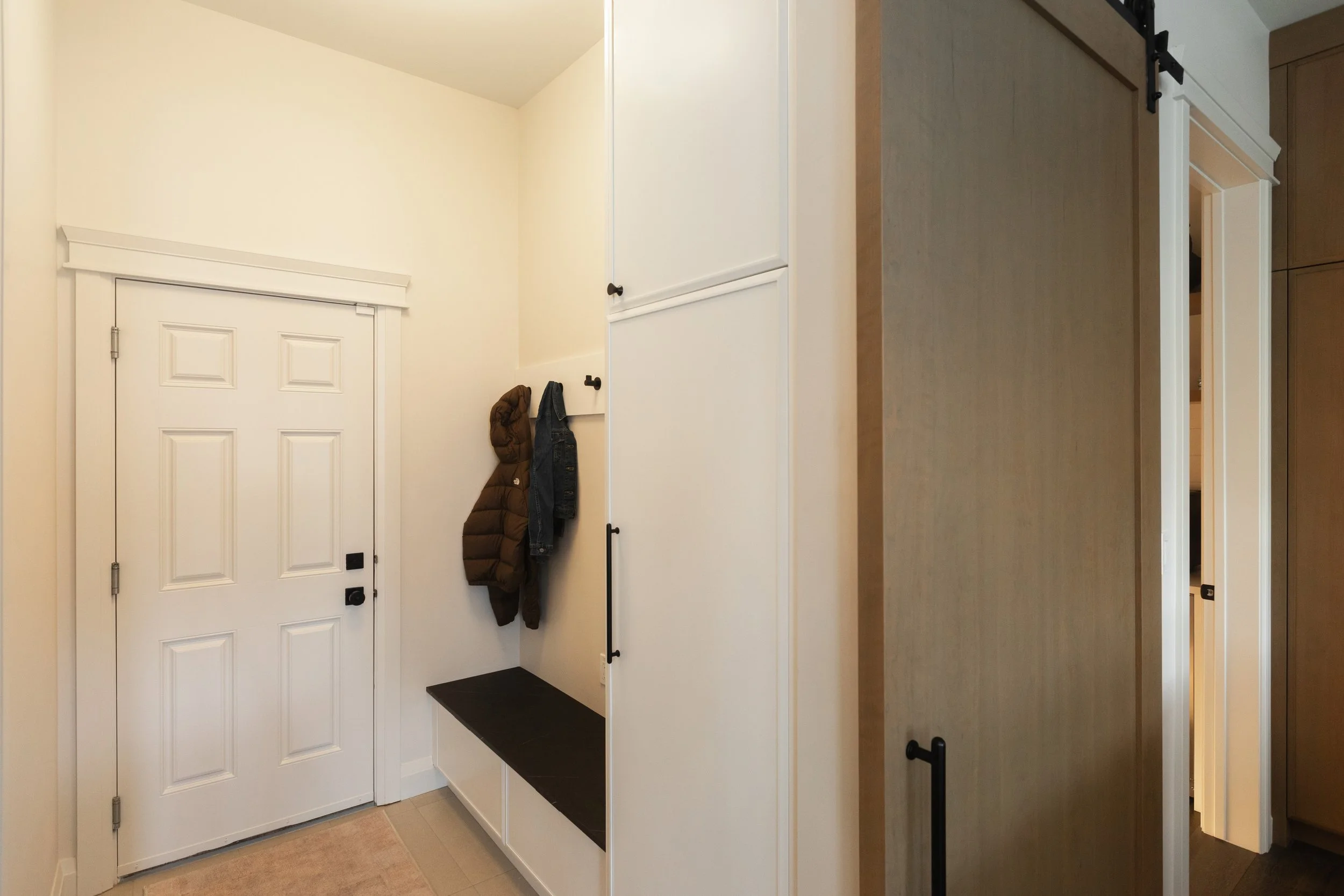 Mudroom in the Sherwood Park Reno by Urbis Infill Homes.