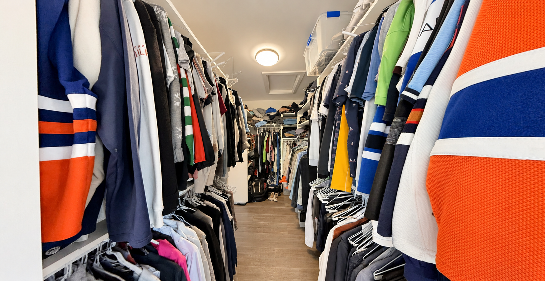 Walk-in closet in the Sherwood Park Reno by Urbis Infill Homes.