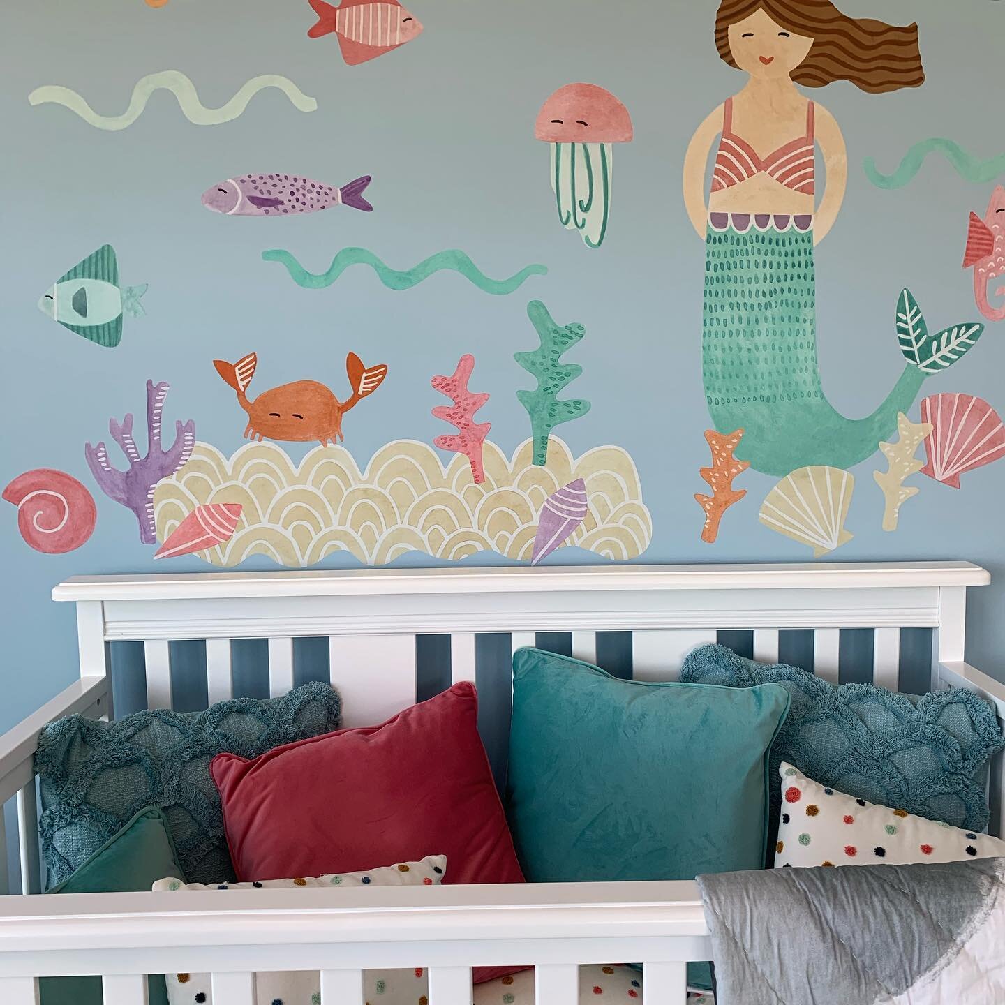 With Memorial Day approaching, interior designers in the Hamptons are busy! I enjoyed taking some time to create this whimsical wall in a little girls seaside nursery. The pillows in the crib will all go on that yet to arrive daybed which will be adj