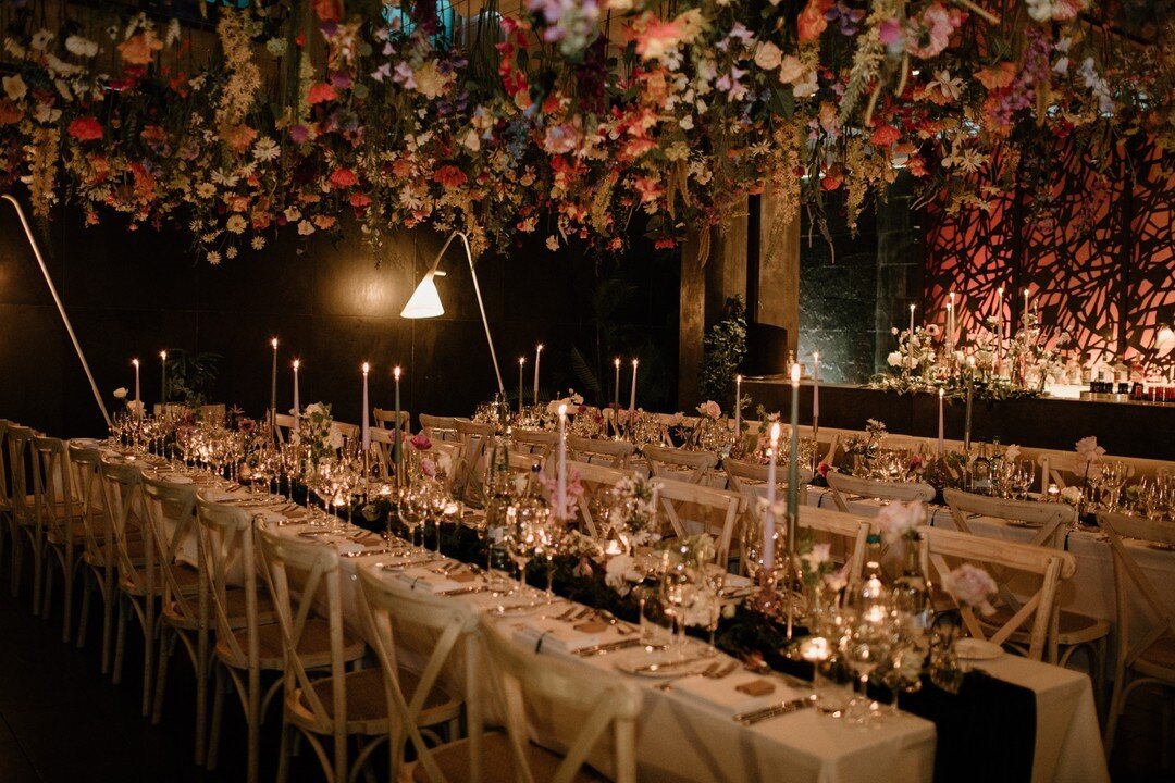 DREAMY TABLESCAPE ALERT - Here is a fully flowered and styled set up for one of our gorgeous couples.  The Secret Garden @southplacehotel with a suspended wild flower ceiling above the dining tables with velvet runners, simple and elegant bud vases f