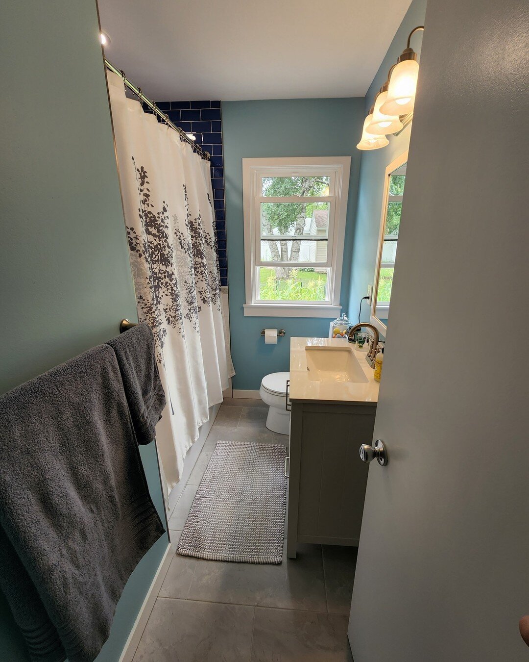 We finished up this colorful little bathroom in Richfield recently. Tile work done by Junker Design and Jose of JVM. The shower turned out excellent!