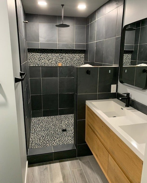 Another one coming to an end in Shakopee, MN. We split a shared main bath and master bath to create a powder room and master suite. Just waiting on shower glass and vanity sconces. More photos and video to come upon completion.