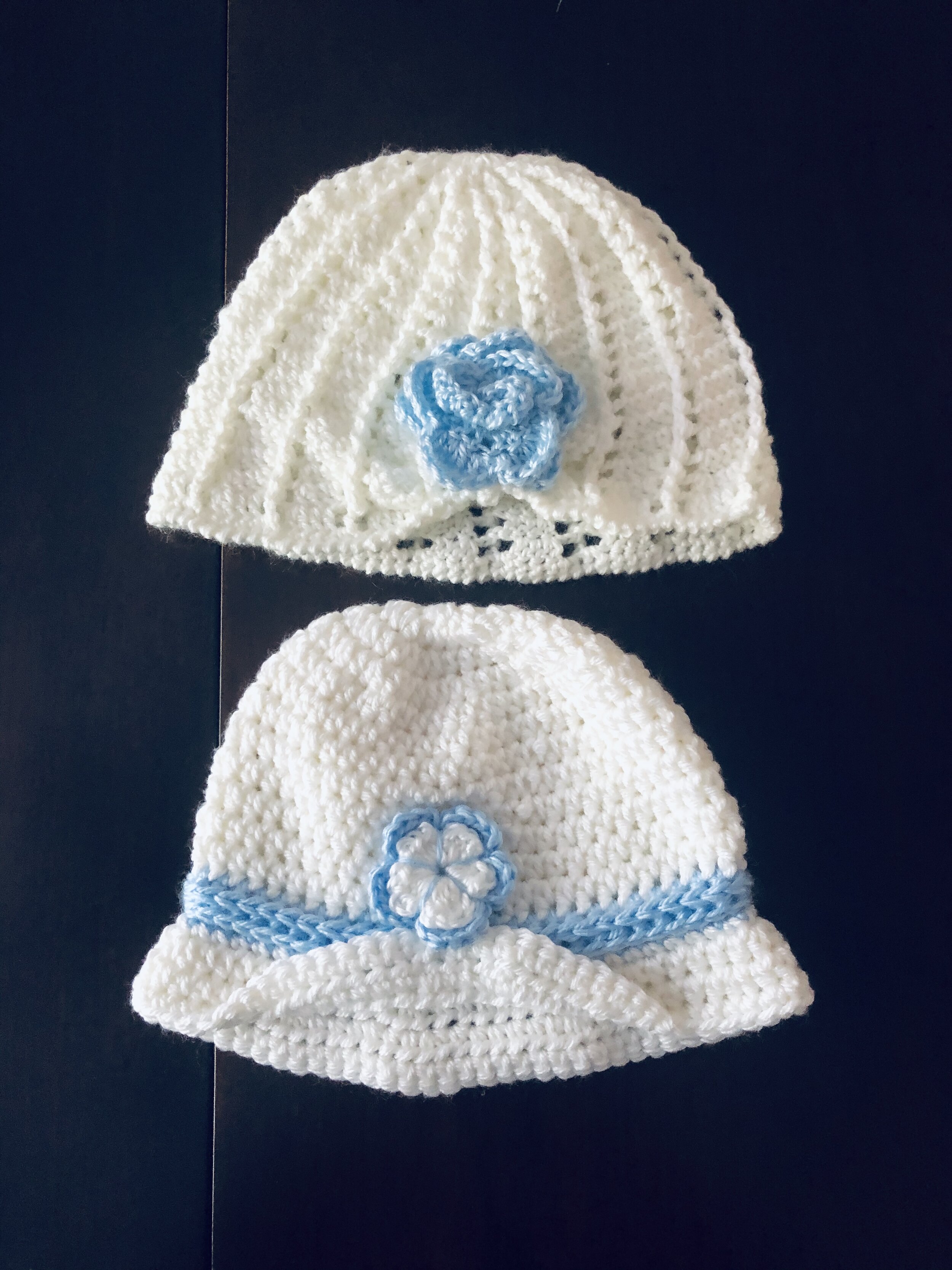 Item #C1069 - White Crochet Hat with Blue Trim and Embelishments