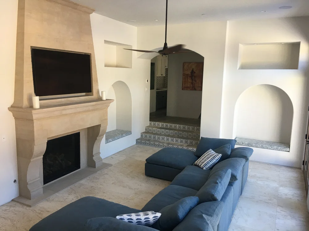  Just down from the kitchen and dining room, the great room serves as a comfortable spot to relax with on-level access to the pool deck. 