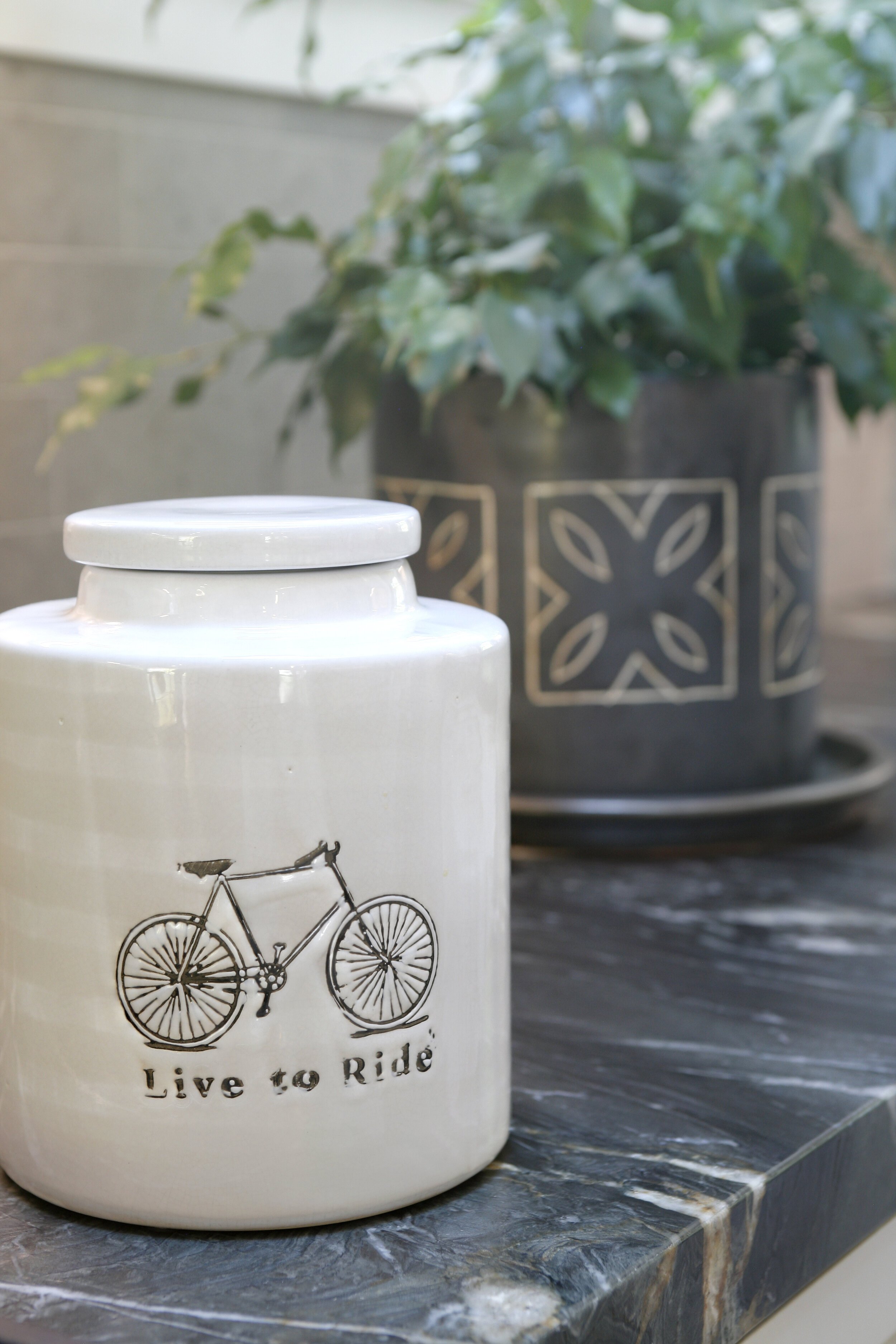 Little touches like this ceramic cookie jar are reflective of Joanne’s passion for biking.