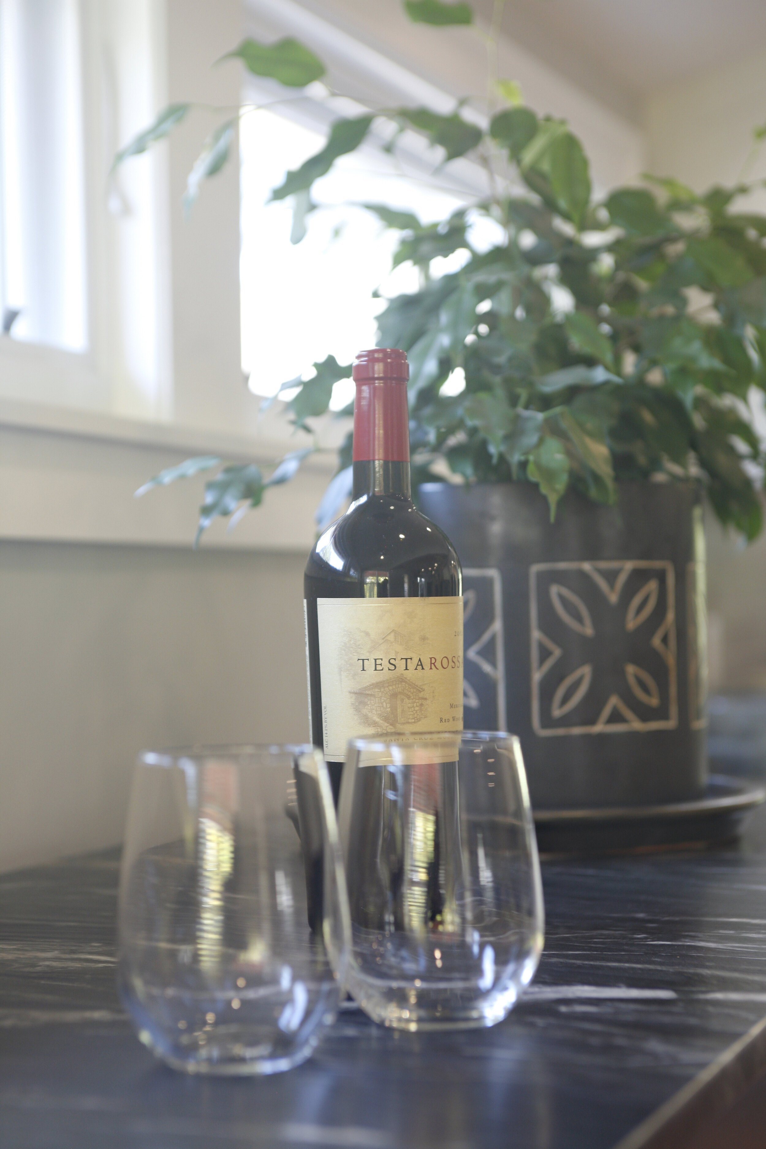 We incorporated a modest wine refrigerator to the kitchen so Joanne can break out a bottle for special guests or her cherished family.