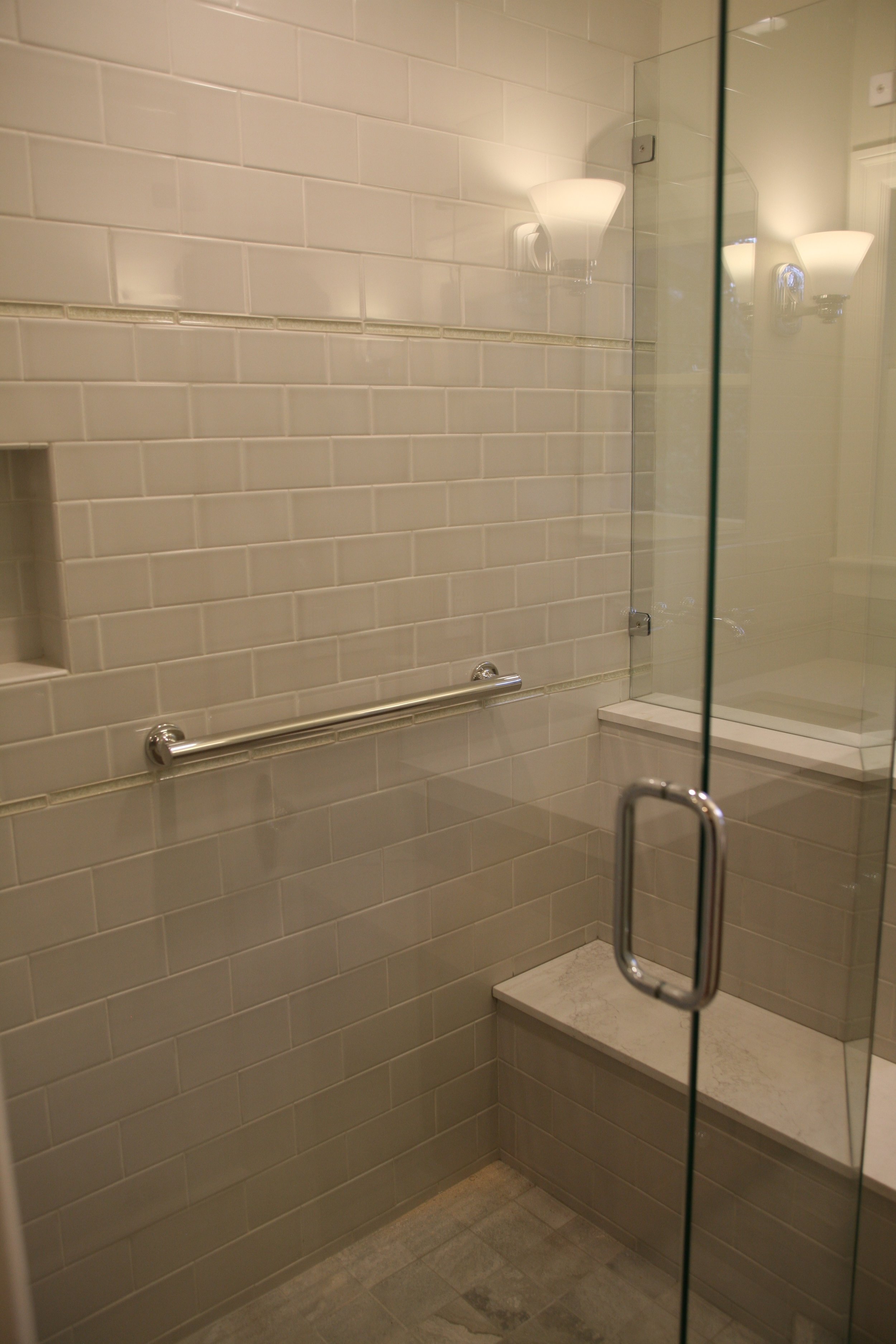 After a few biking accidents, it became paramount that the bathroom become be more ADA friendly which was achieved without compromising on materials or design.