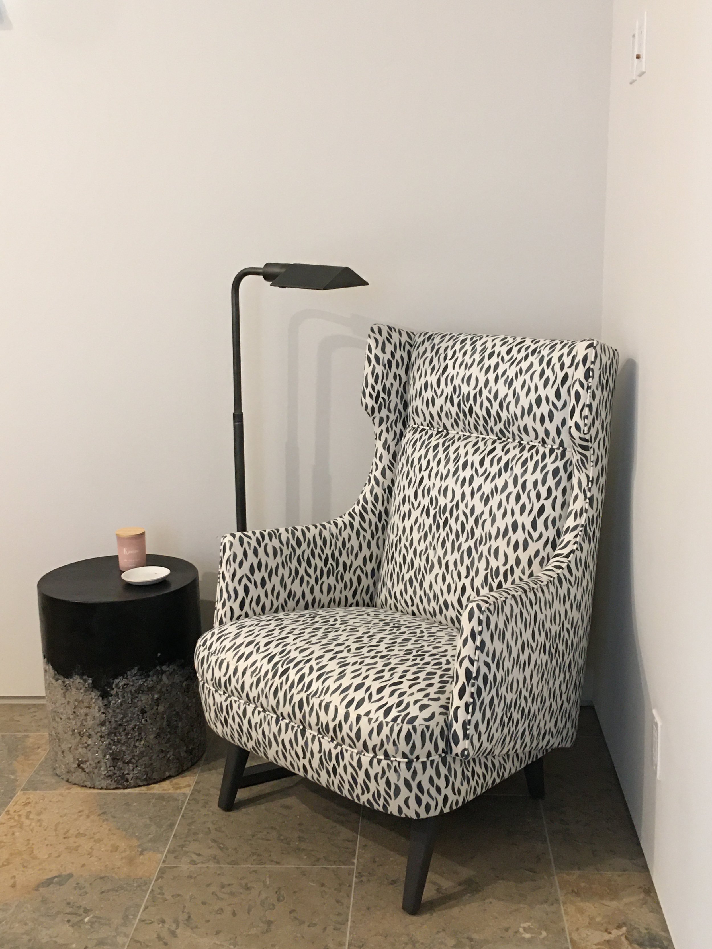  Custom upholstery pieces and artist-made furniture creates an elevated yet simple and quiet space to read. 