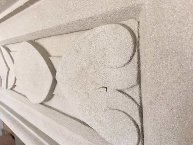  Custom designed stone mantel to represent the family. 