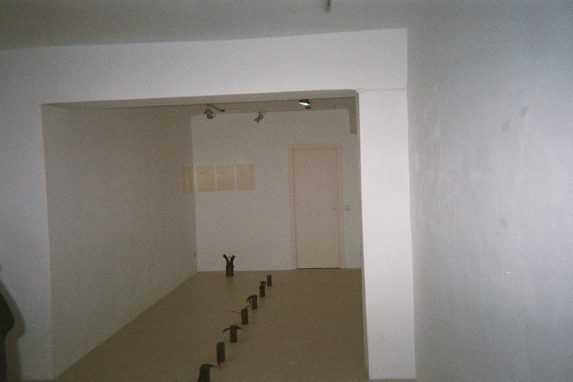 Interior of an art gallery with an installation of marabou boxes.