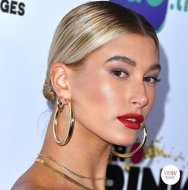 Gold Girl Hailey Bieber looks fierce in her big and bold Gold hoop earrings and layered necks.