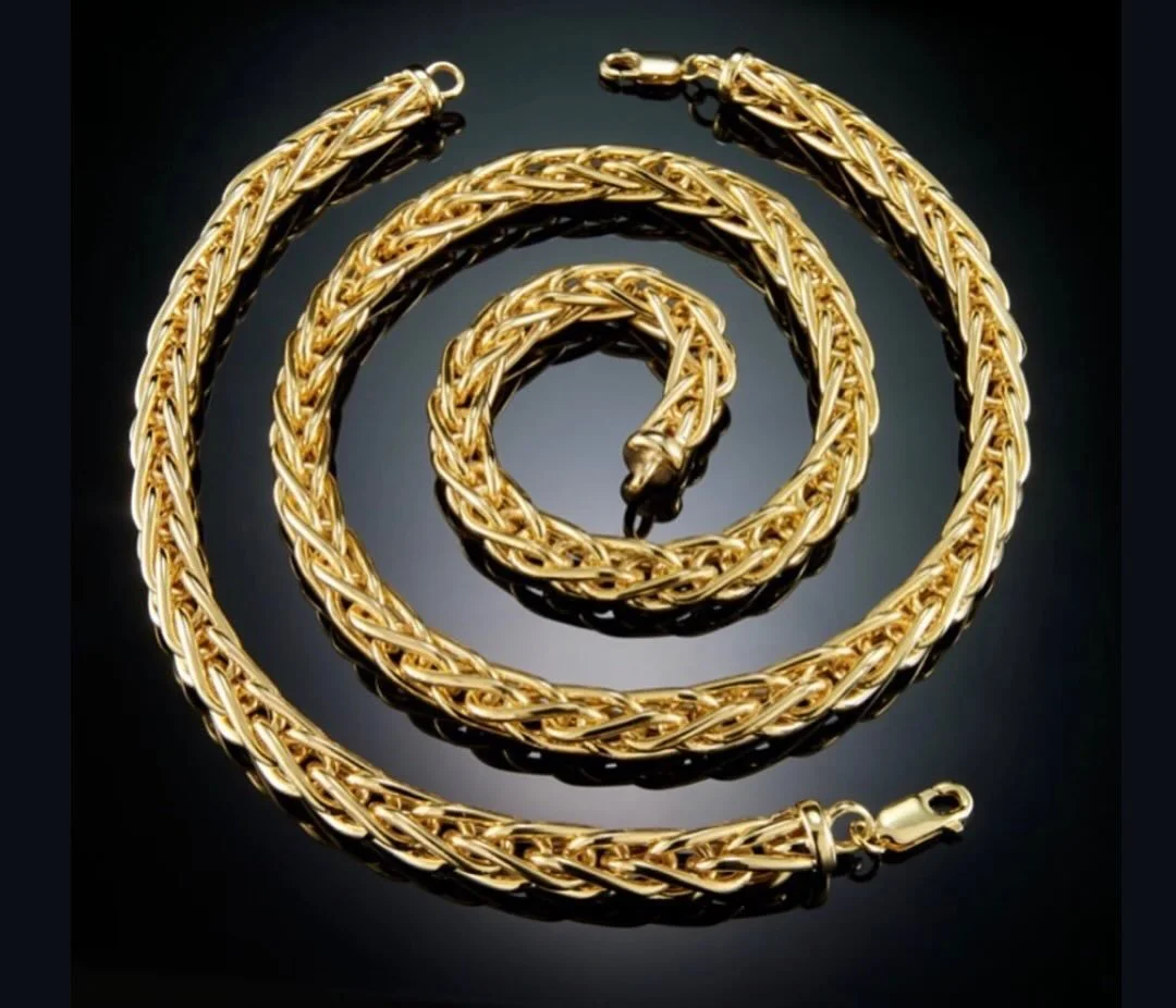 The Woven Collection crafted in 14K yellow gold formed around sterling silver.