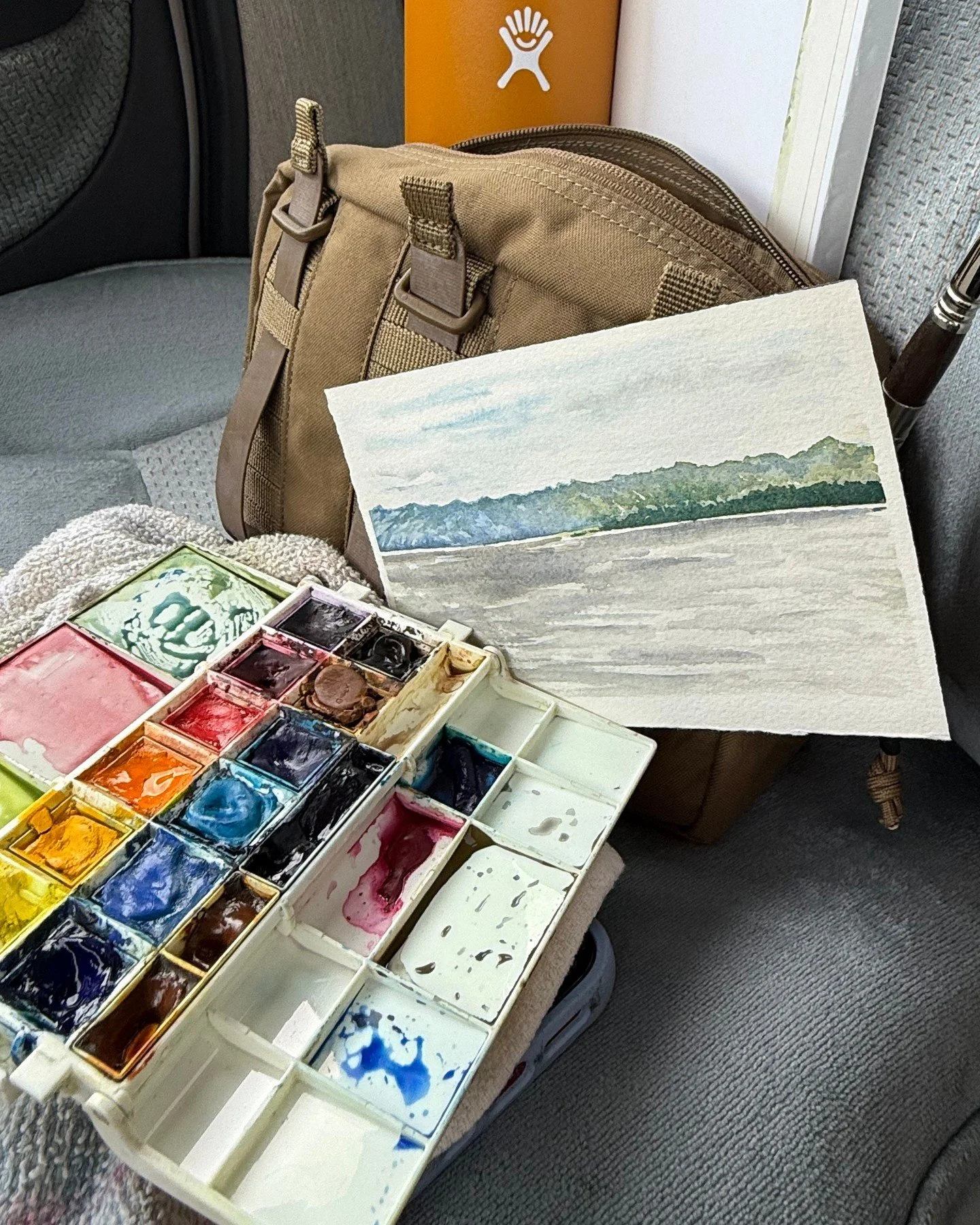 Mobile studio essentials - mostly everything I need fits in this compact setup. The well-worn palette tells stories of countless painting sessions across thousands of miles.

Teaching has always been a big part of my work for 30 years, culminating in