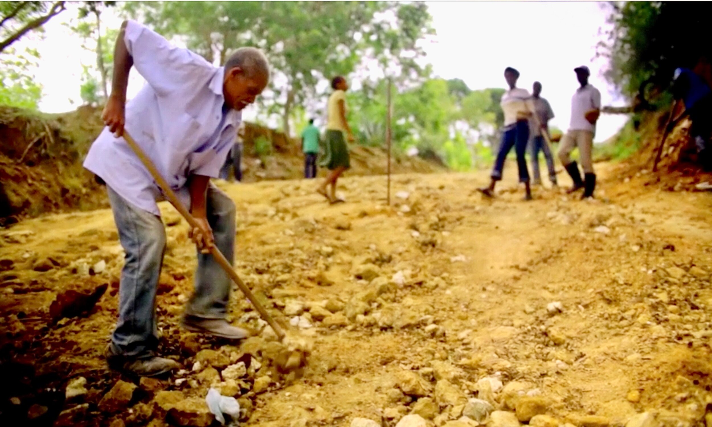 Occine 'Cine' Chery working on the Fondwa road.jpeg
