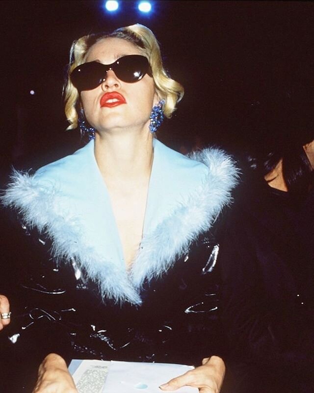 Madonna attends a Thierry Mugler show, 1990