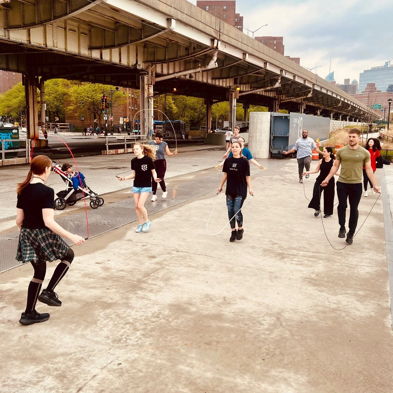 A group of jump ropers under the FDR Drive in New York City