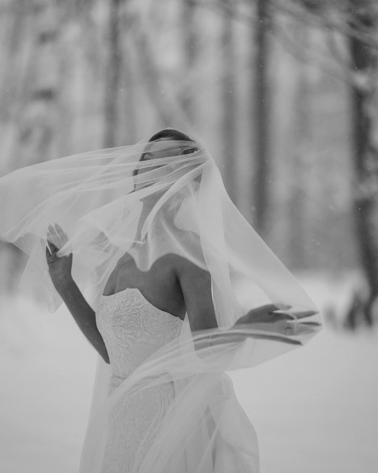 Snow is romantic&hellip; and also technically unhinged.

Your camera wants to focus on snowflakes, not faces. Movement becomes hip-deep strategy. Hands go numb. Batteries tap out early. You&rsquo;re basically shooting a luxury winter wedding while hi