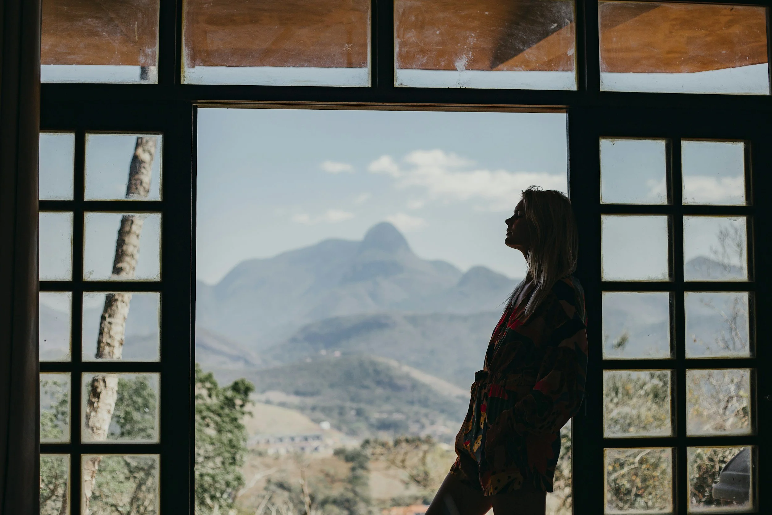 woman looking peaceful in the desert - light into you