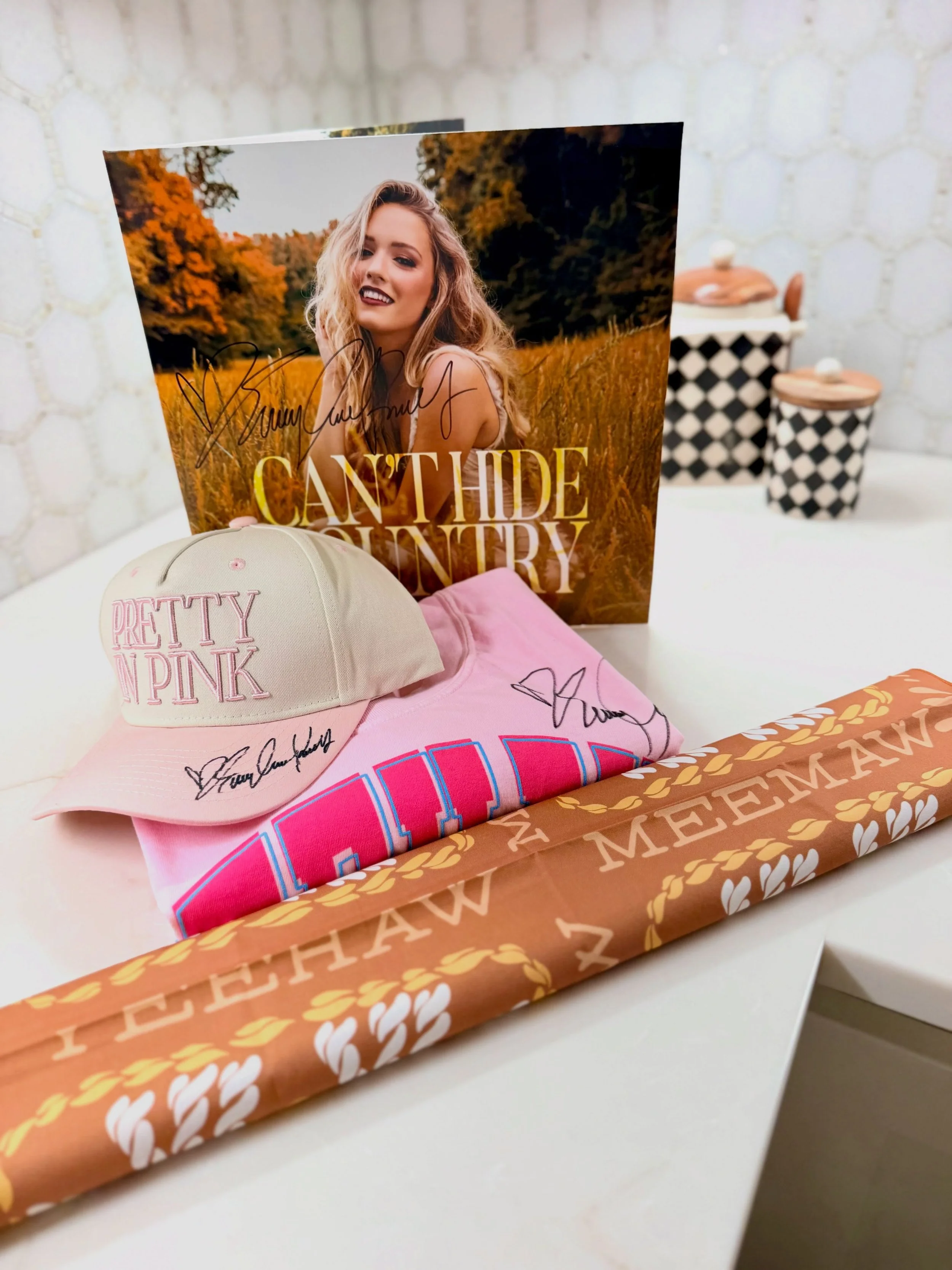 Calling all Yeehaw Meemaws, Bam Girls, and anyone with good taste! The one and only Emily Ann Roberts has generously donated some goodies, and they&rsquo;re officially UP FOR GRABS! All signatures come with a letter of authenticity included in the pa