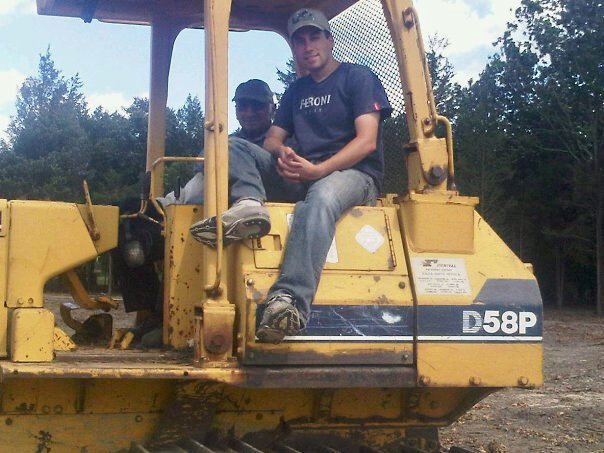 Anthony and Louie clearing blueberry land.jpeg