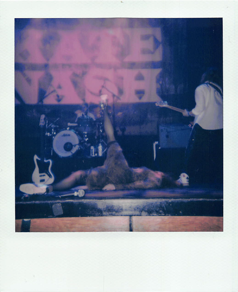 Kate Nash performs at The Howard Theatre in Washington DC as part of her "9 Sad Symphonies" tour. Shot on polaroid film.