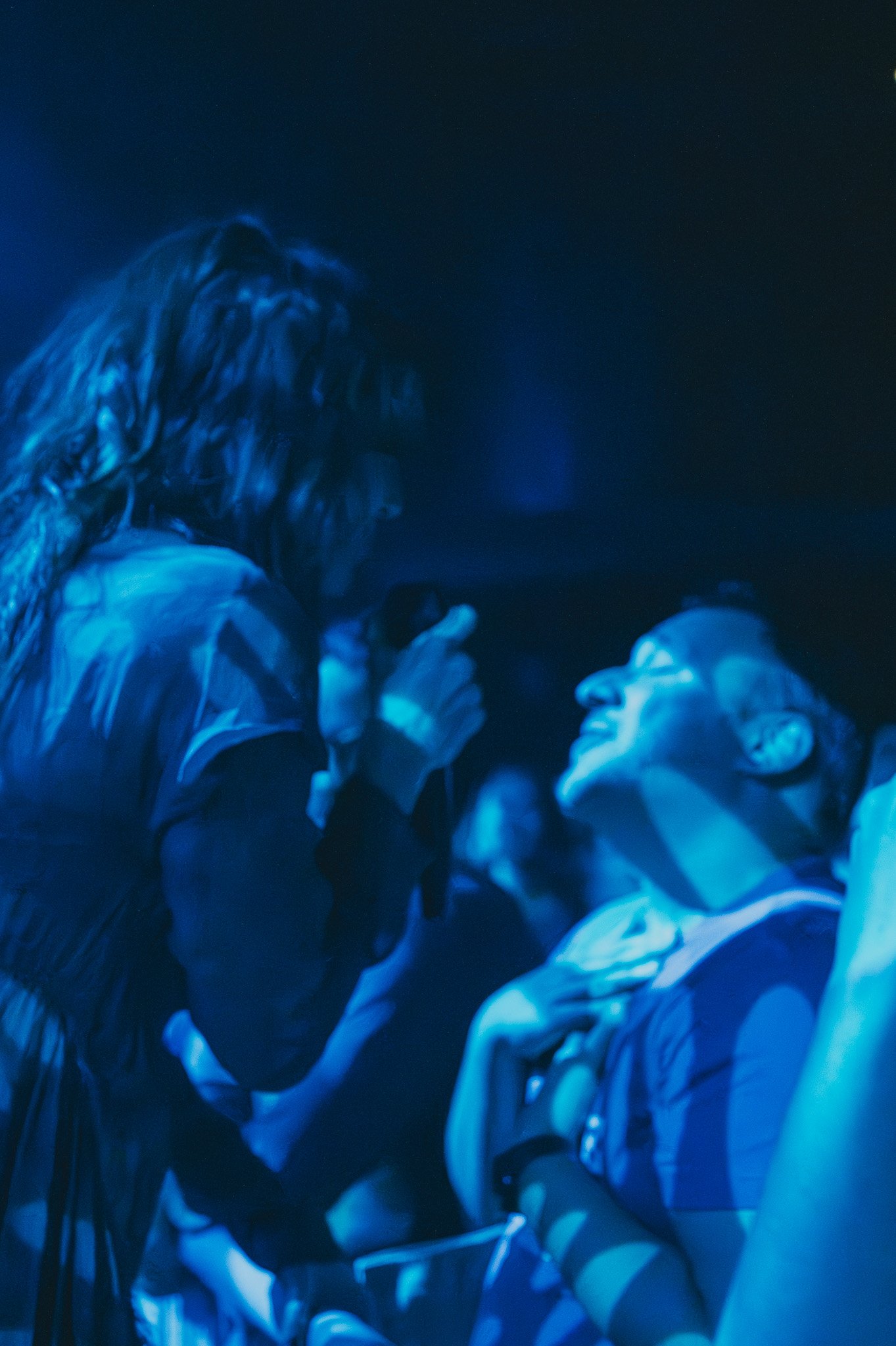 Kate Nash performs to a fan at The Howard Theatre in Washington DC as part of her "9 Sad Symphonies" tour