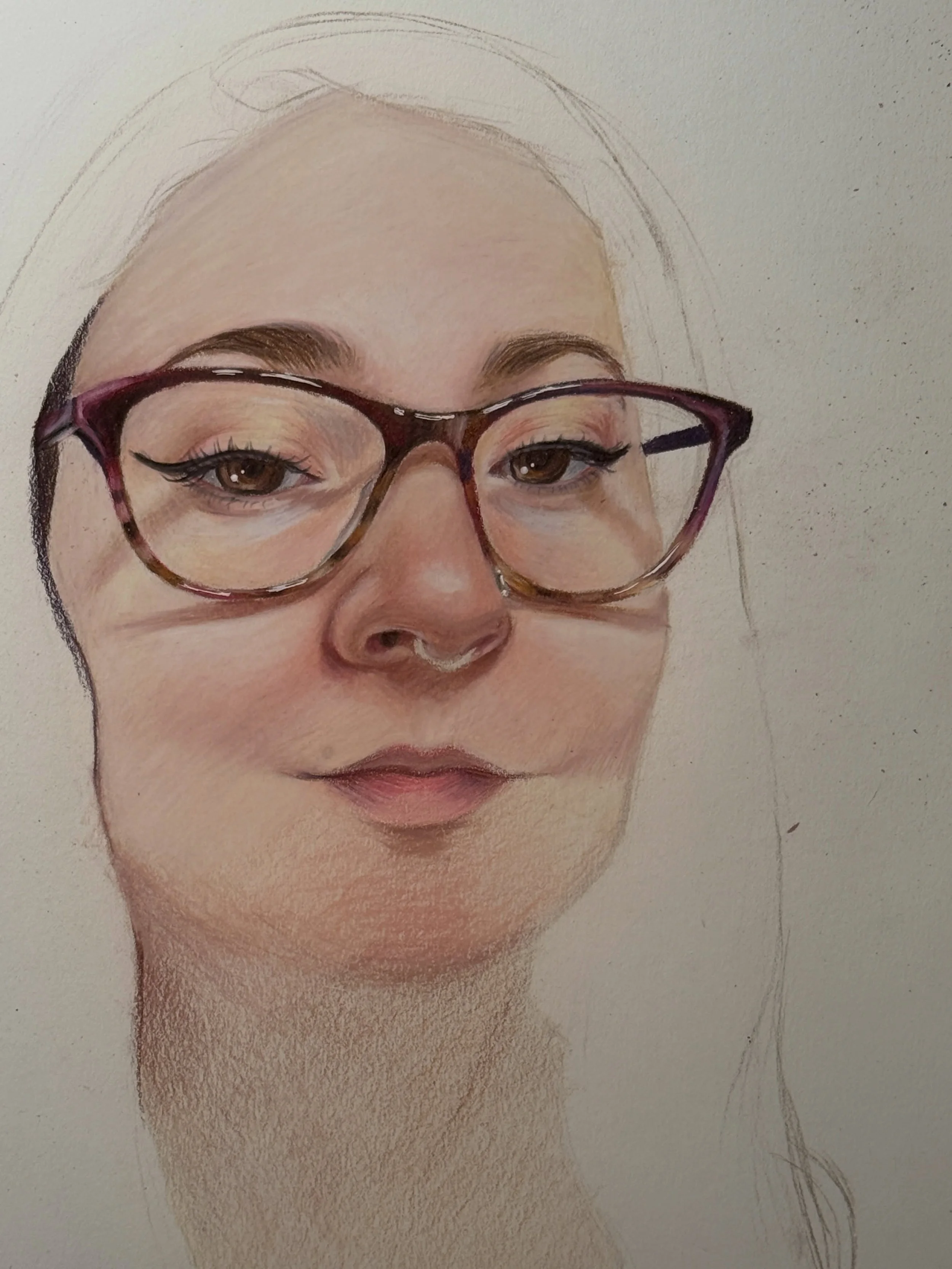 Work in progress of my 2026 self-portrait. Done with colored pencils! What do you think so far?