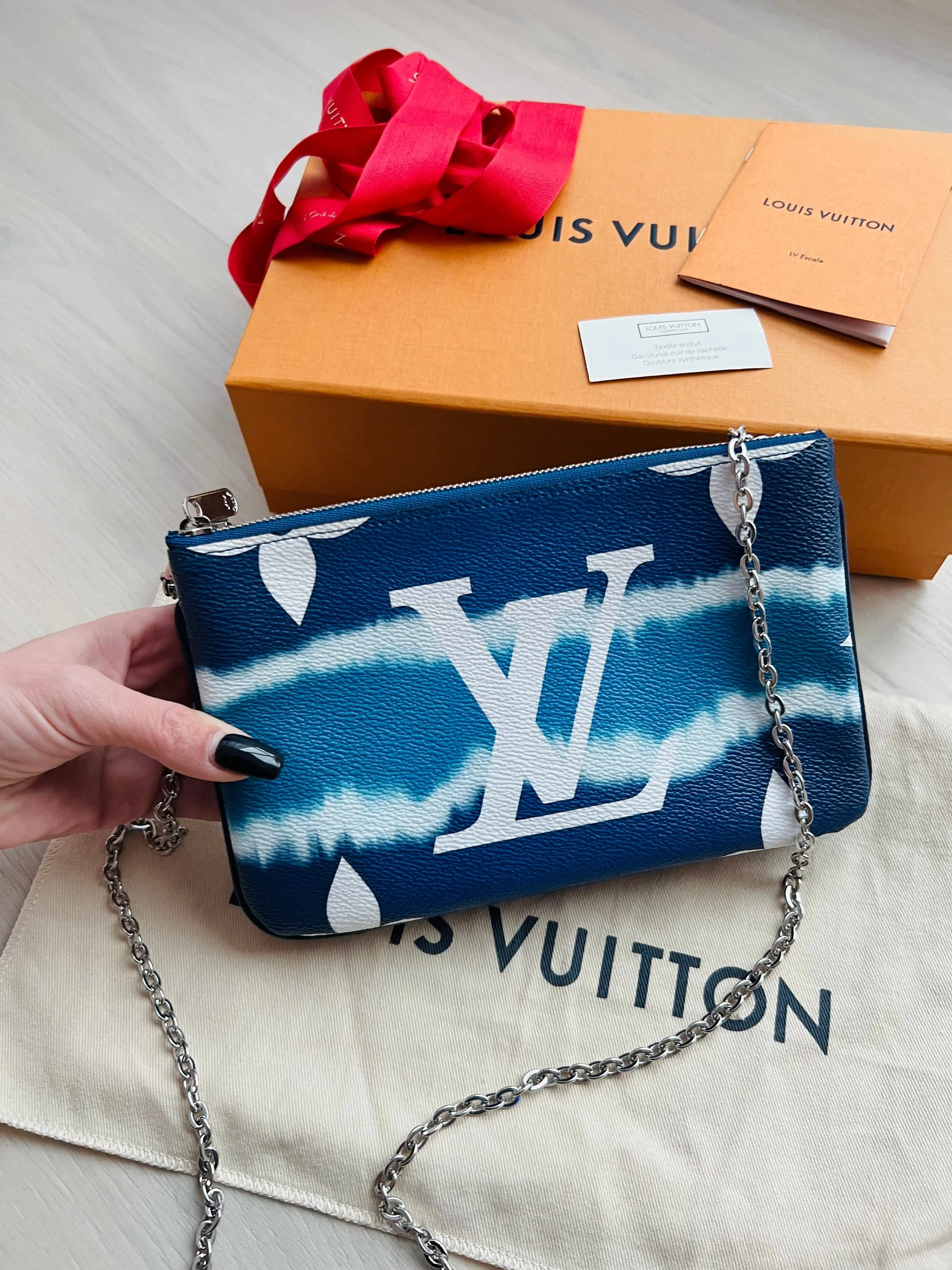 Louis Vuitton Double Zip Escale Pochette — DESIGNER TAKEAWAY BY QUEEN OF  LUXURY BOUTIQUE INC.